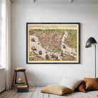 The image is a framed vintage map of a city, depicting a detailed and colorful representation of the city's layout, including waterways, buildings, and ships.