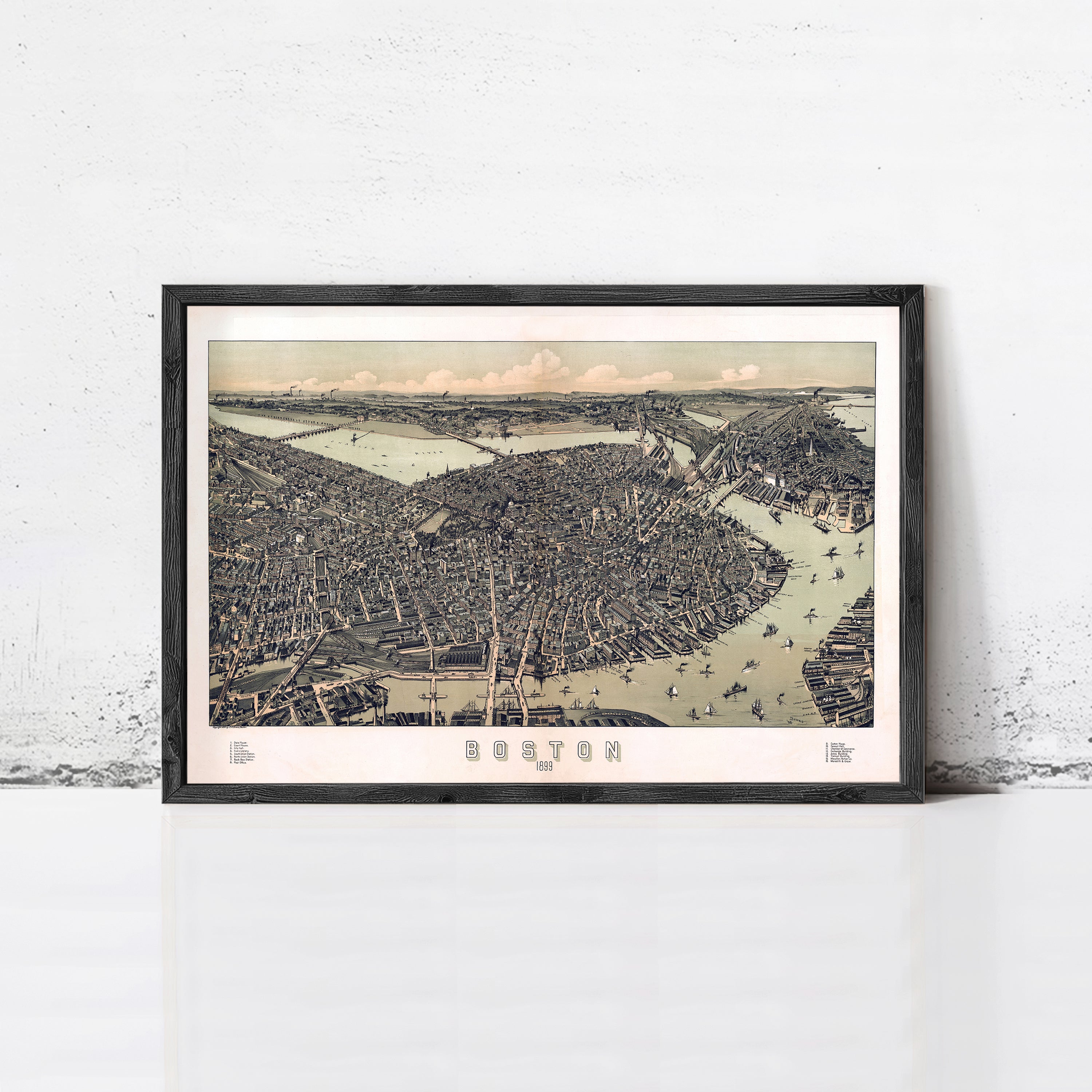 The image is a framed vintage map of Boston, depicting the city's layout and surrounding areas.