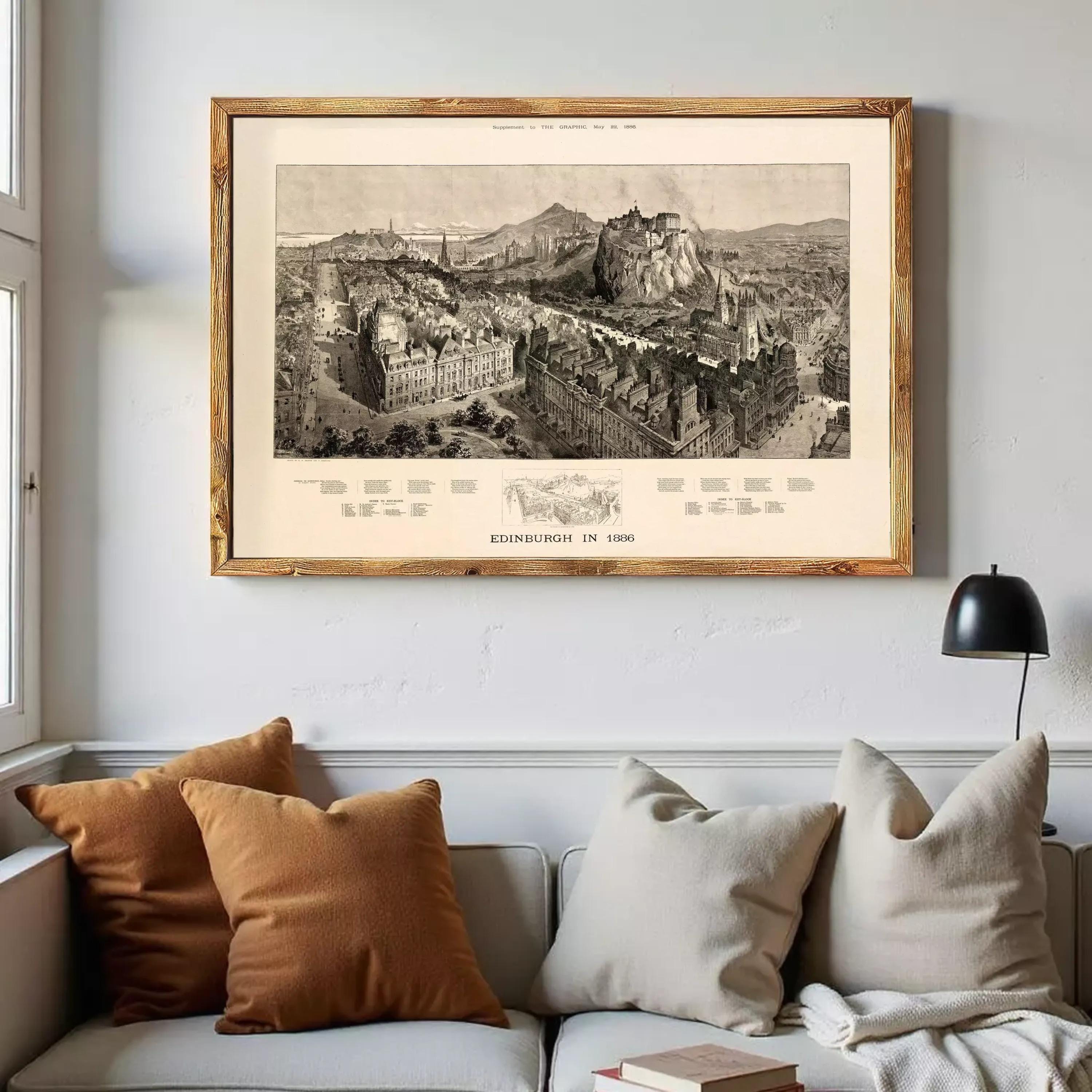 a framed black and white illustration of Edinburgh, Scotland, with a cityscape and buildings visible.