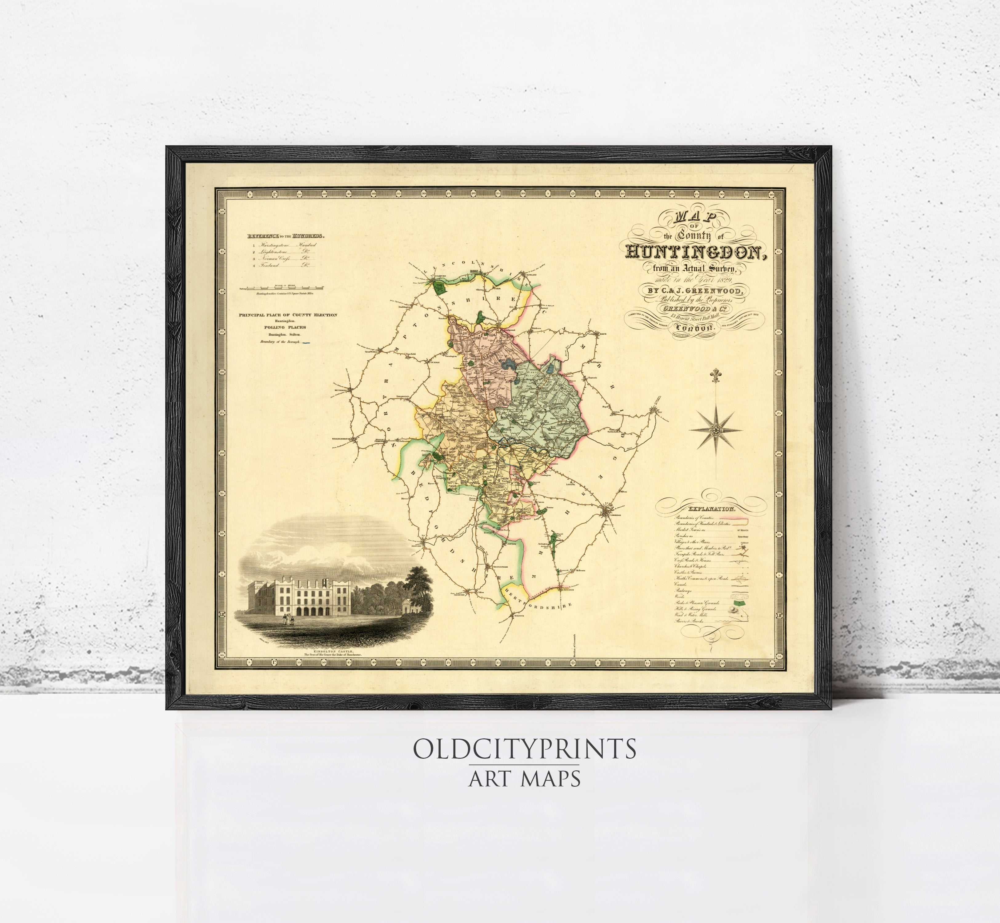 The image is a framed antique map of Huntingdon, Pennsylvania, with a detailed illustration of the area and surrounding landscape.