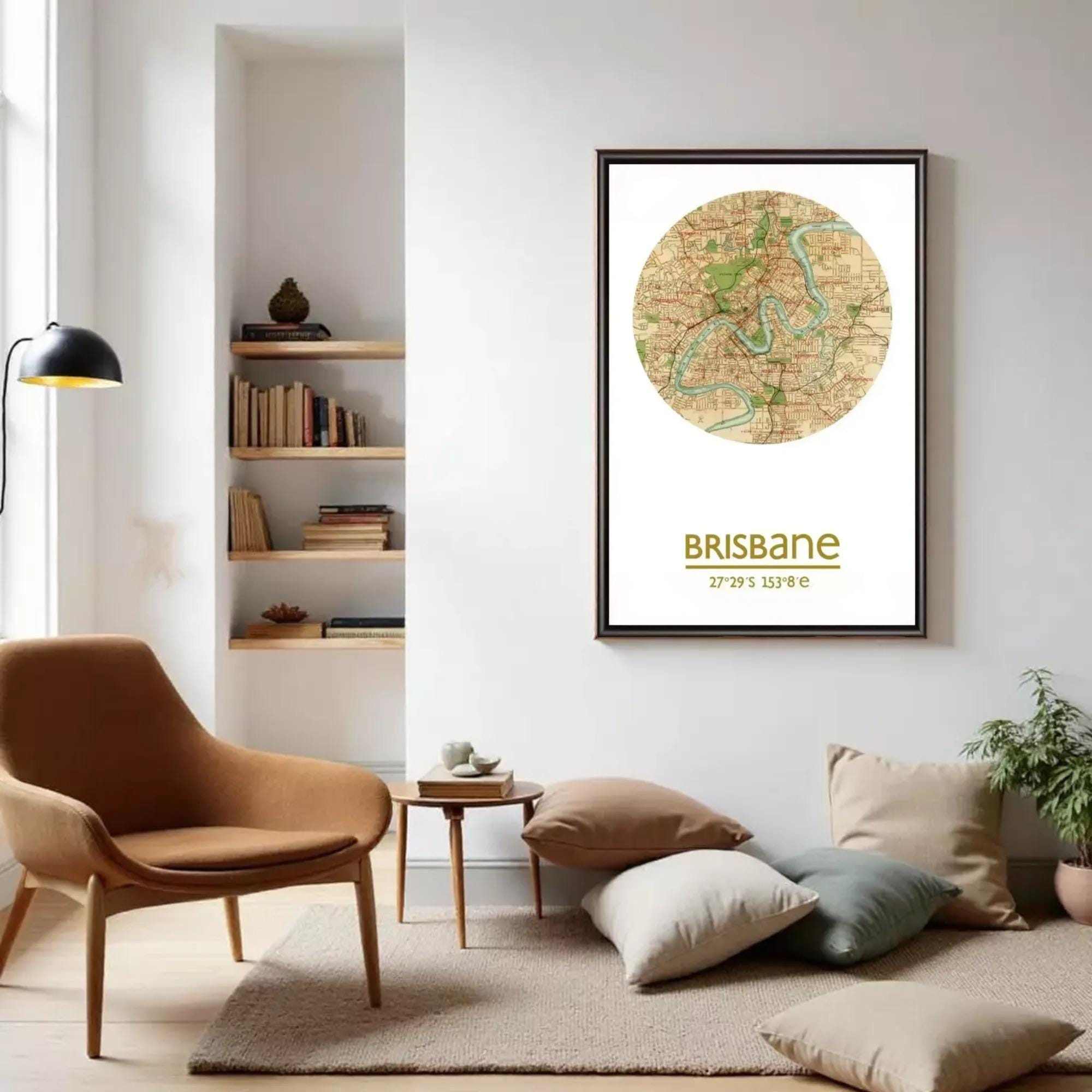 a living room with a brown armchair, a wooden side table, and a framed map of Brisbane on the wall.
