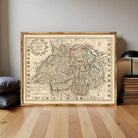 The image is a framed antique map of Europe, featuring detailed geographical information and various symbols and labels.