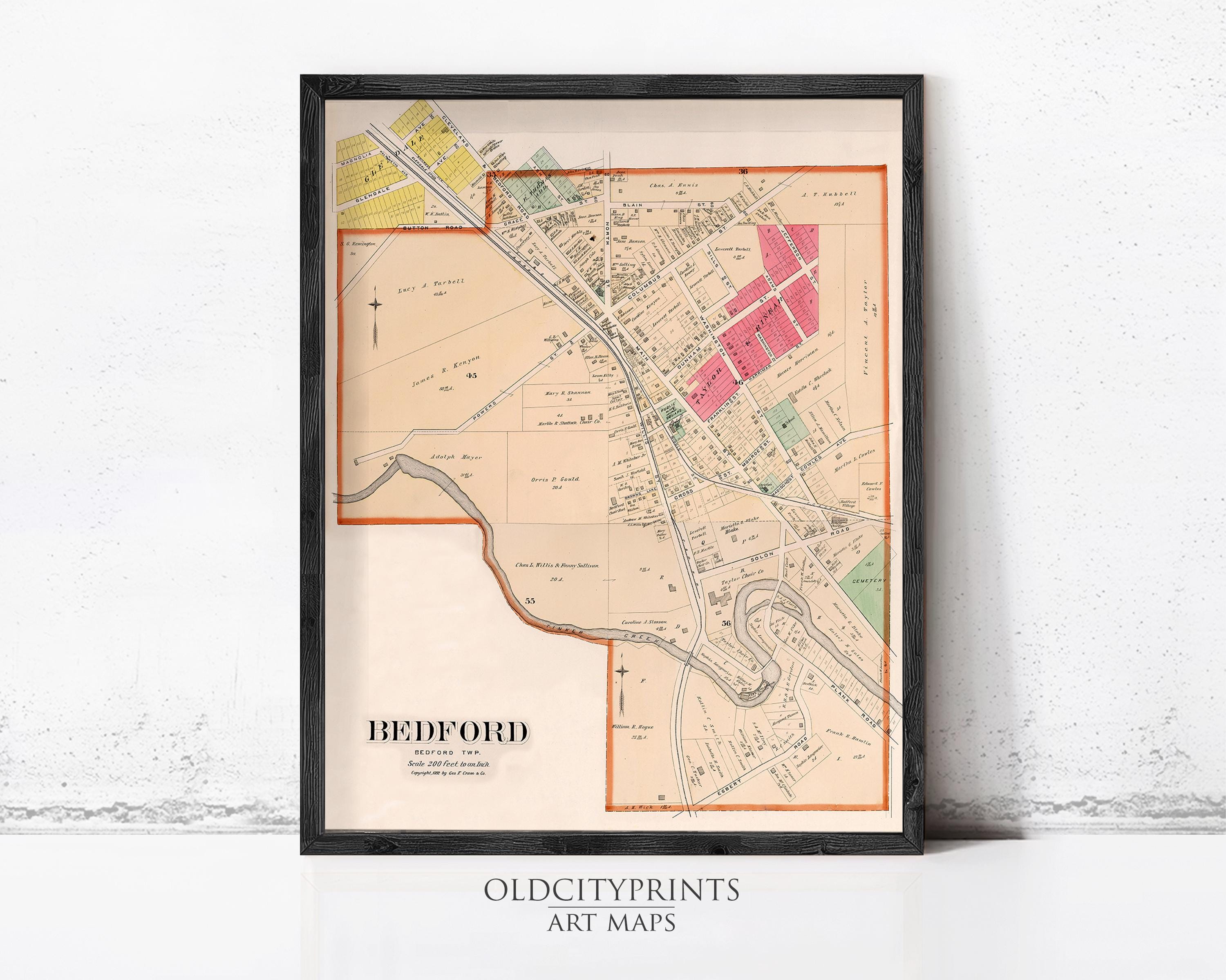 A framed vintage map of Bedford, New Jersey, with a color-coded legend and various streets and landmarks labeled.
