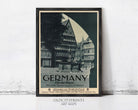 The image is a framed poster advertising a trip to Germany, featuring a photograph of a historic building and a fountain.