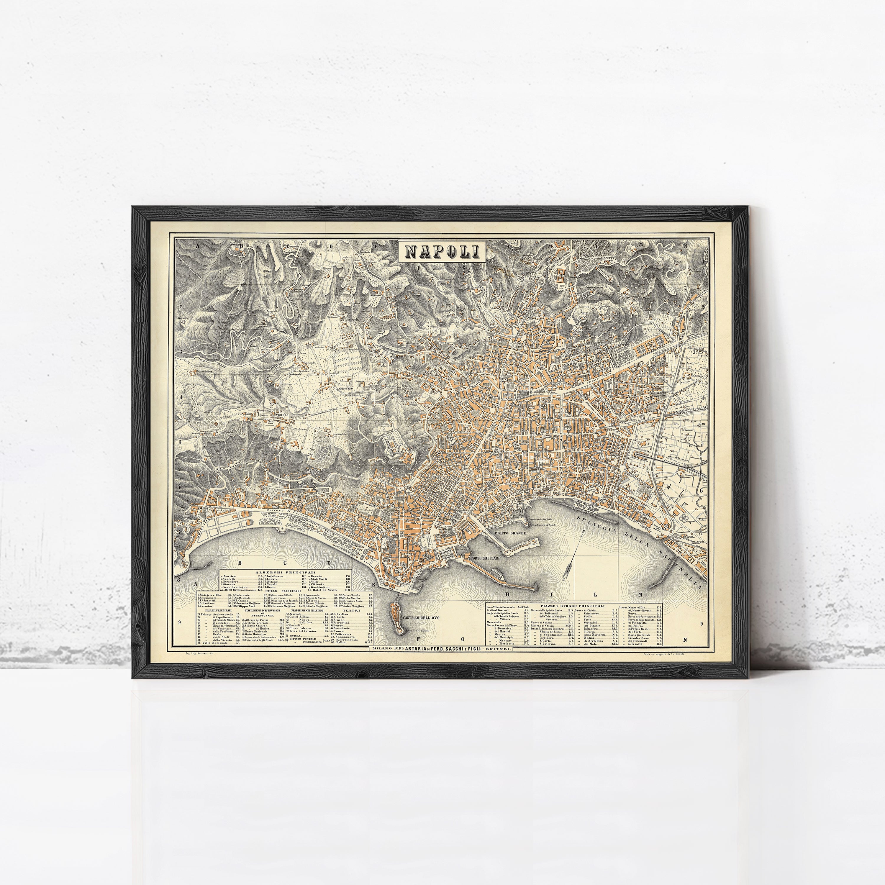 The image is a framed vintage map of the city of Naples, Italy, depicting the city's layout and surrounding areas.