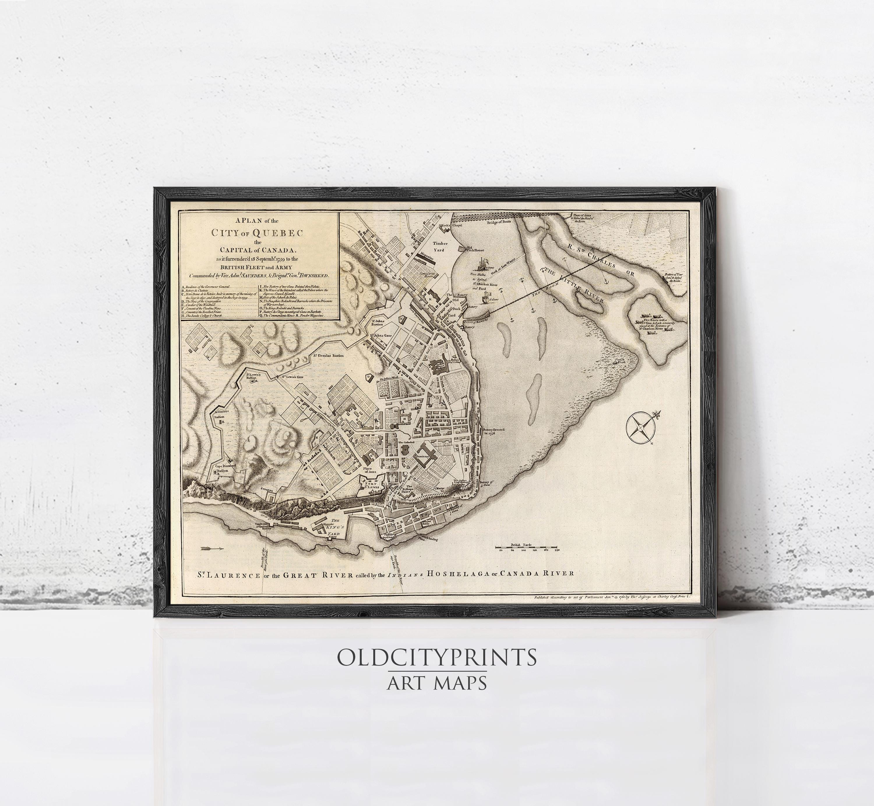 The image is a framed antique map of the city of Saint-Québec, Canada, depicting the city's layout and surrounding areas.