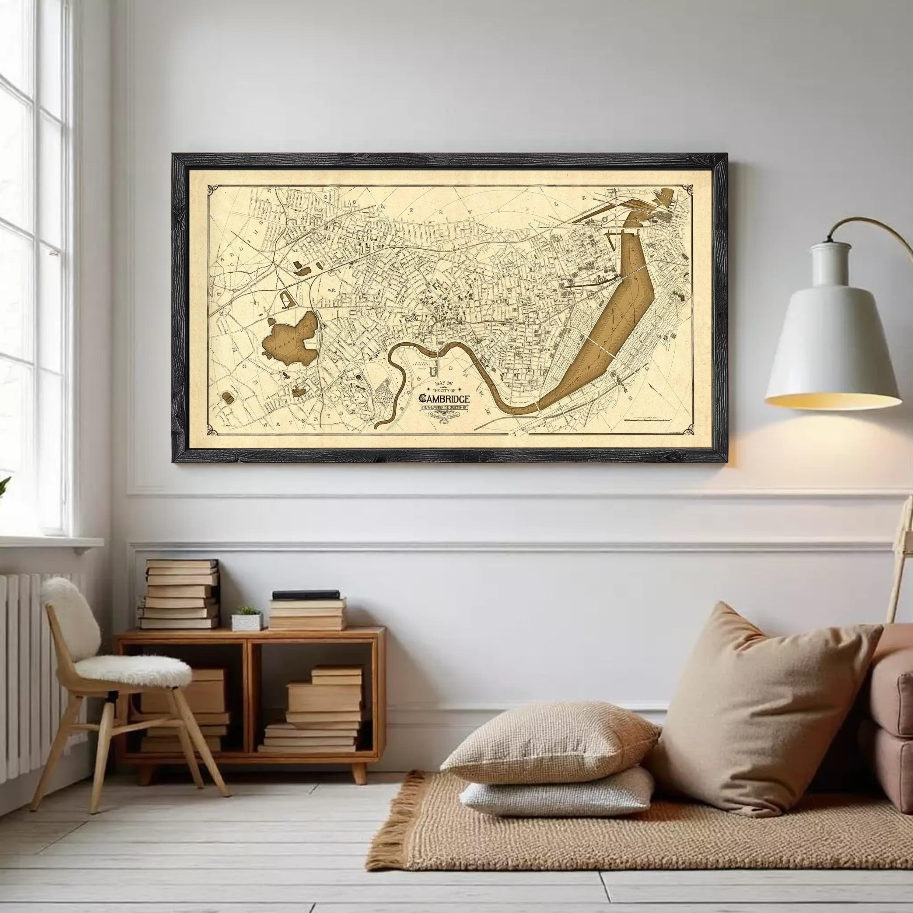 The image is a framed vintage map of Cambridge, Massachusetts, depicting a detailed layout of the city and surrounding areas.
