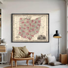The image is a framed vintage map of Ohio, featuring a detailed and colorful depiction of the state's geography and surrounding areas.