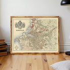 a framed vintage map of the city of Marseille, France, with a wooden frame and a black and white color scheme.