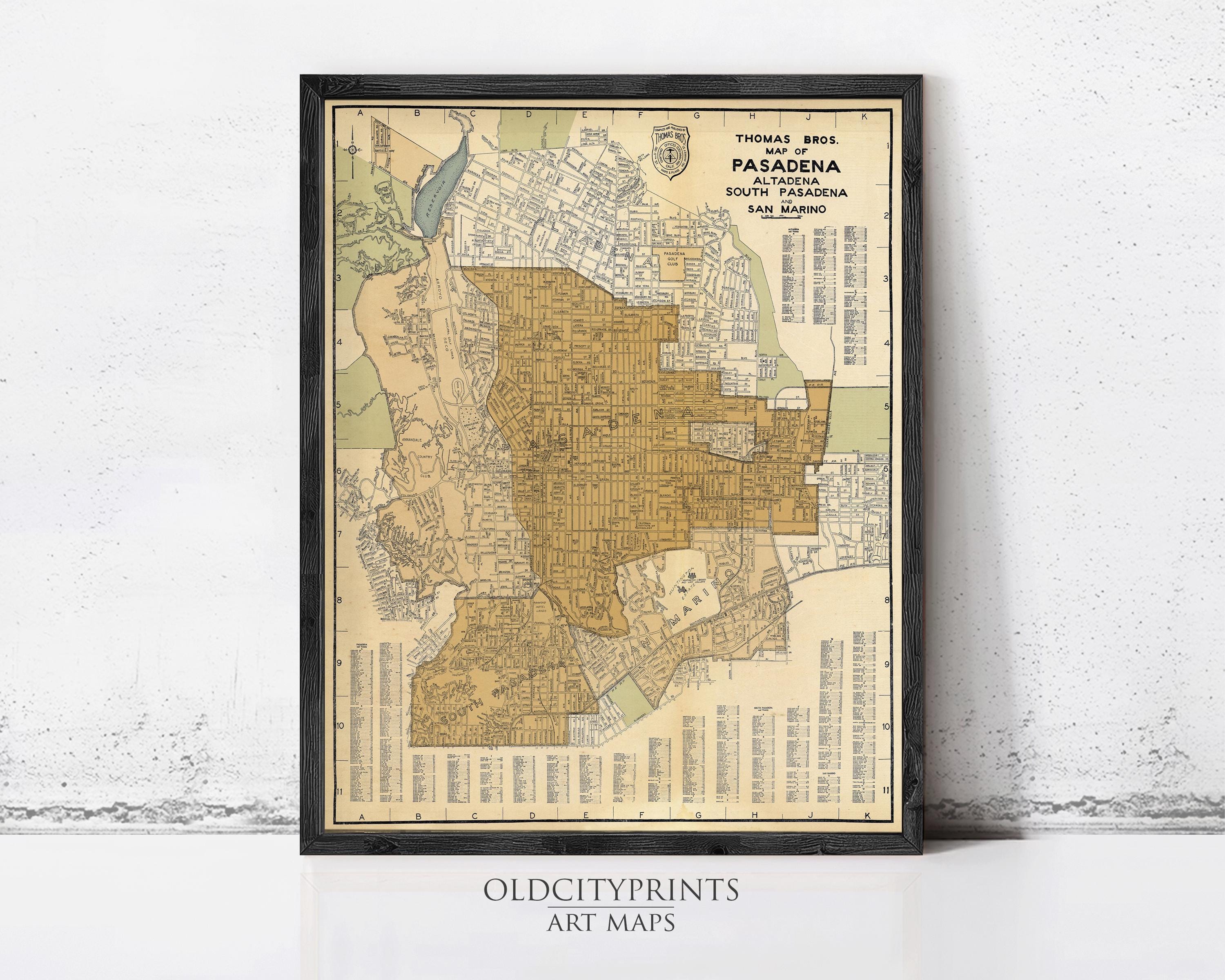 The image is a framed vintage map of the city of Pasadena, California, with a black border and a beige background.