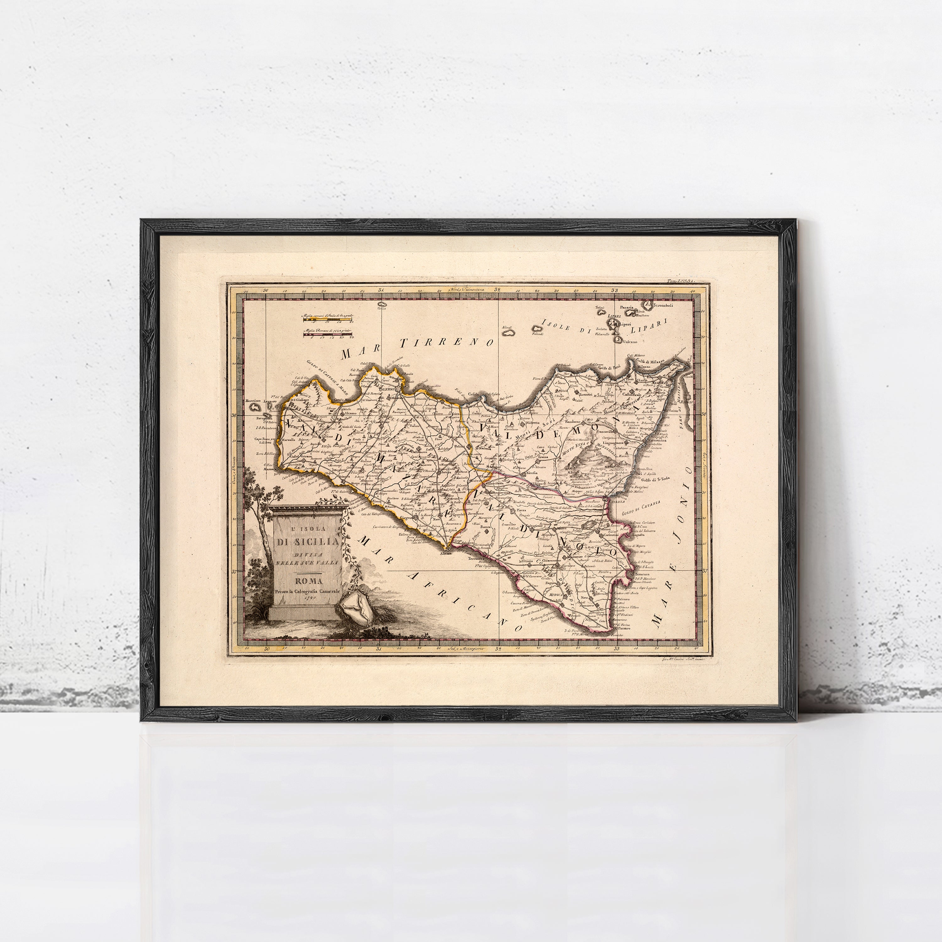 The image is a framed antique map of Italy, depicting the country's geographical layout and boundaries.