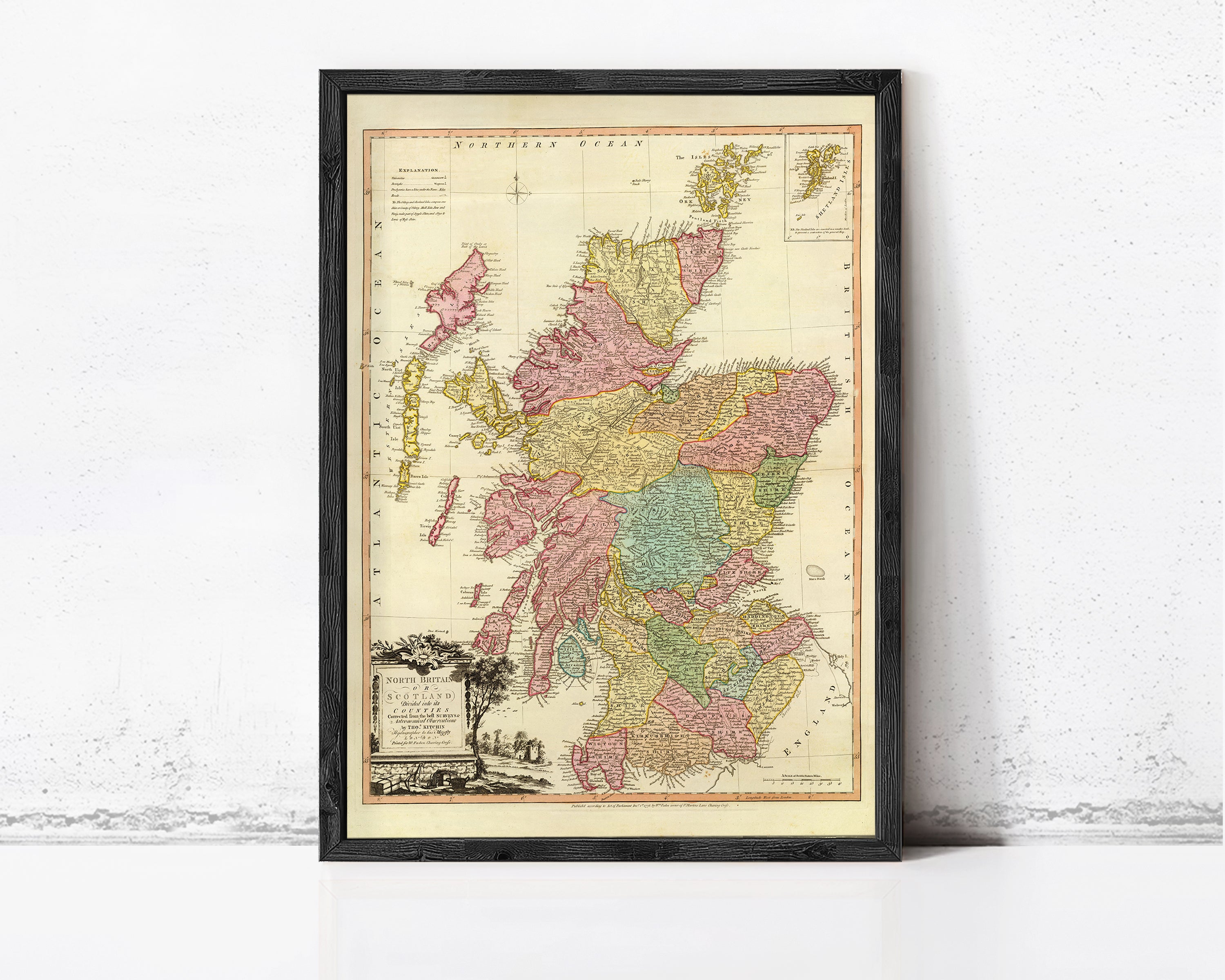 The image is a framed map of Scotland, showing the country's geographical layout and boundaries.