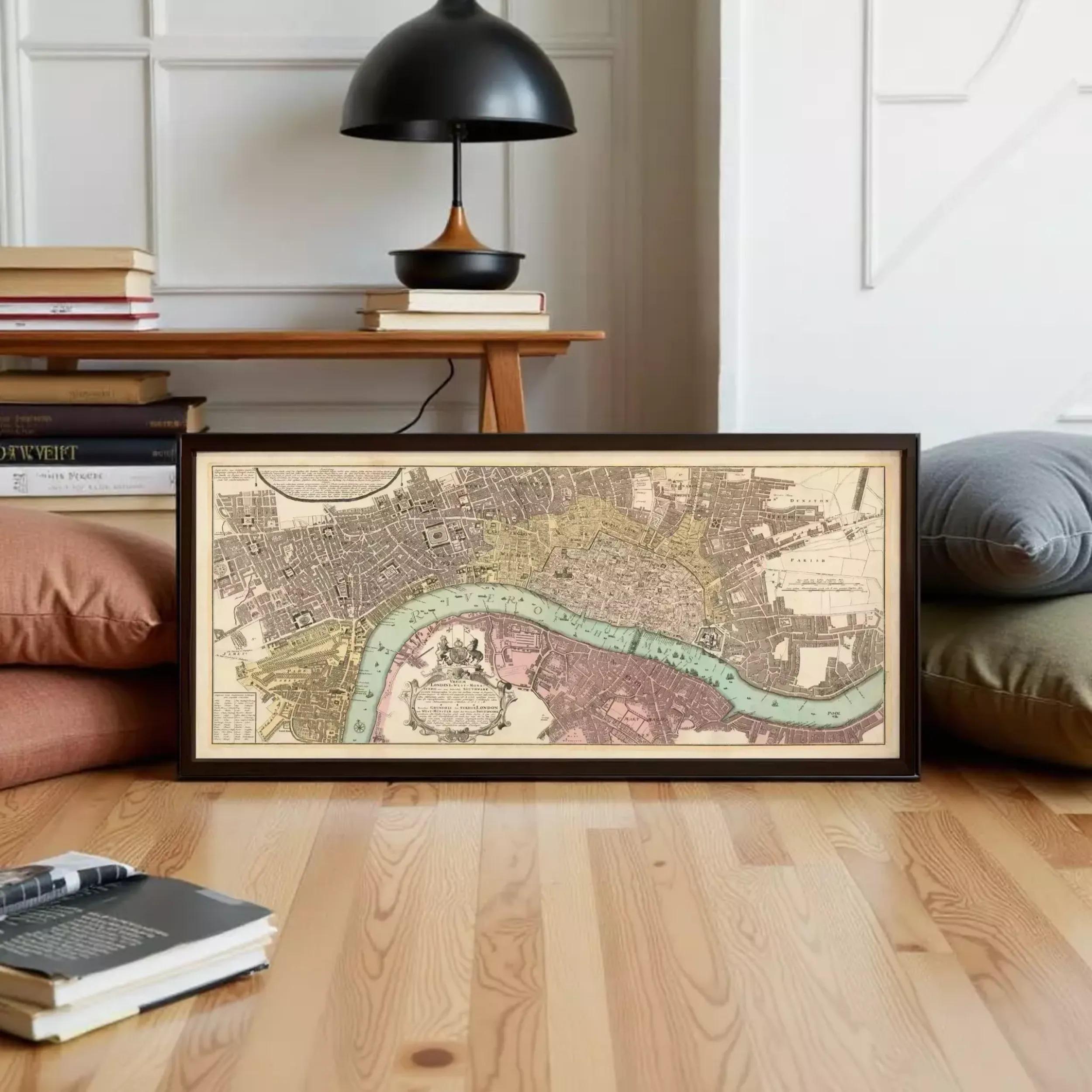 A framed historical map of London, featuring a detailed illustration of the city's streets, landmarks, and waterways.