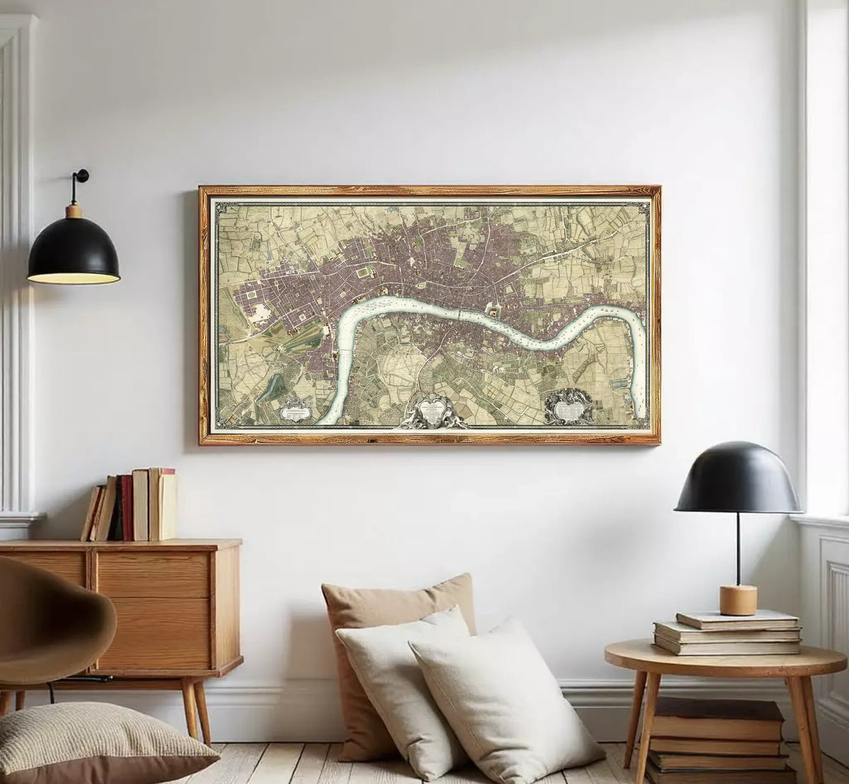A framed map of London, England, with a river running through the city.