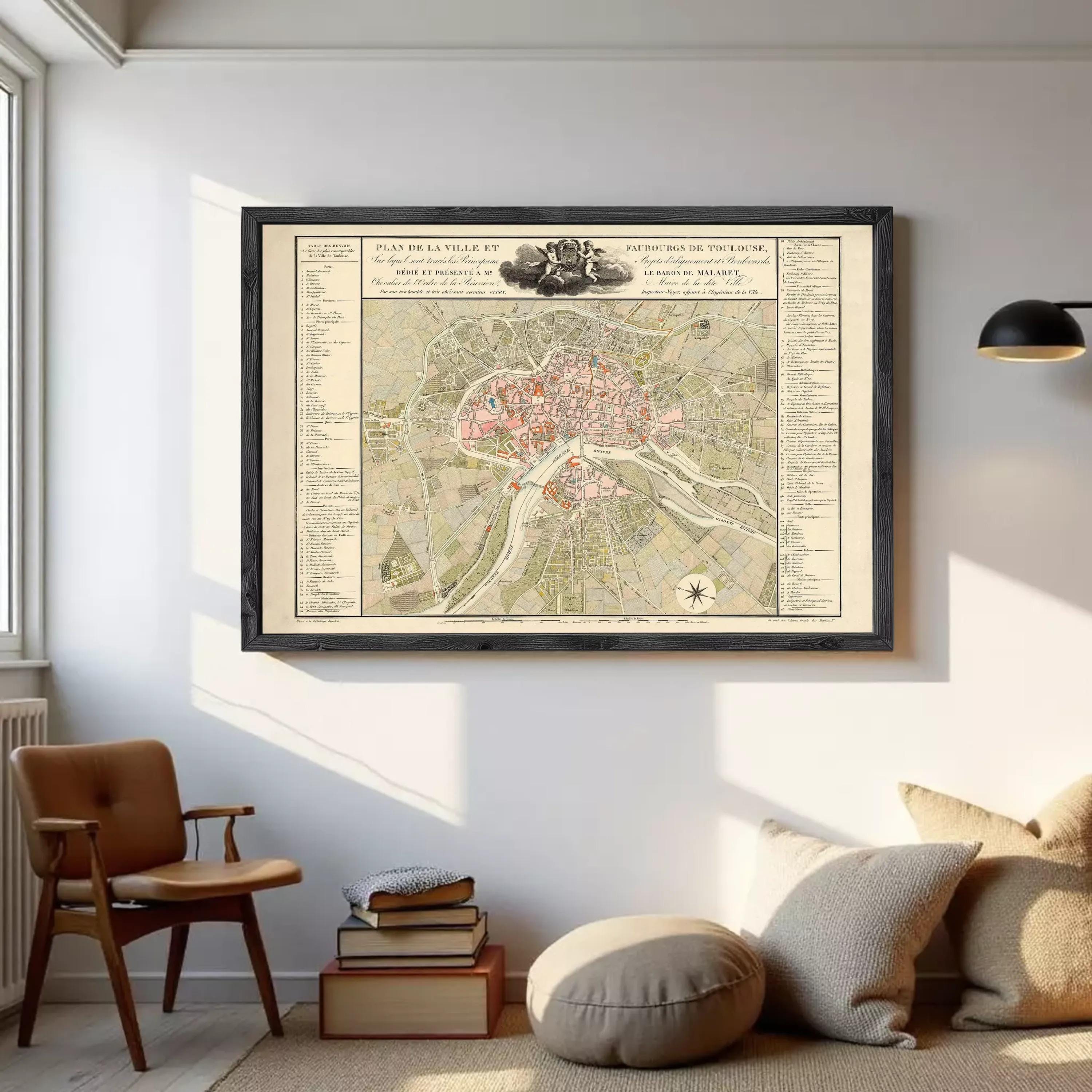 The image is a framed vintage map of a city, likely Paris, with detailed street names and landmarks.