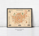 The image is a framed vintage map of a city, likely from the 19th century, with various landmarks and buildings depicted.
