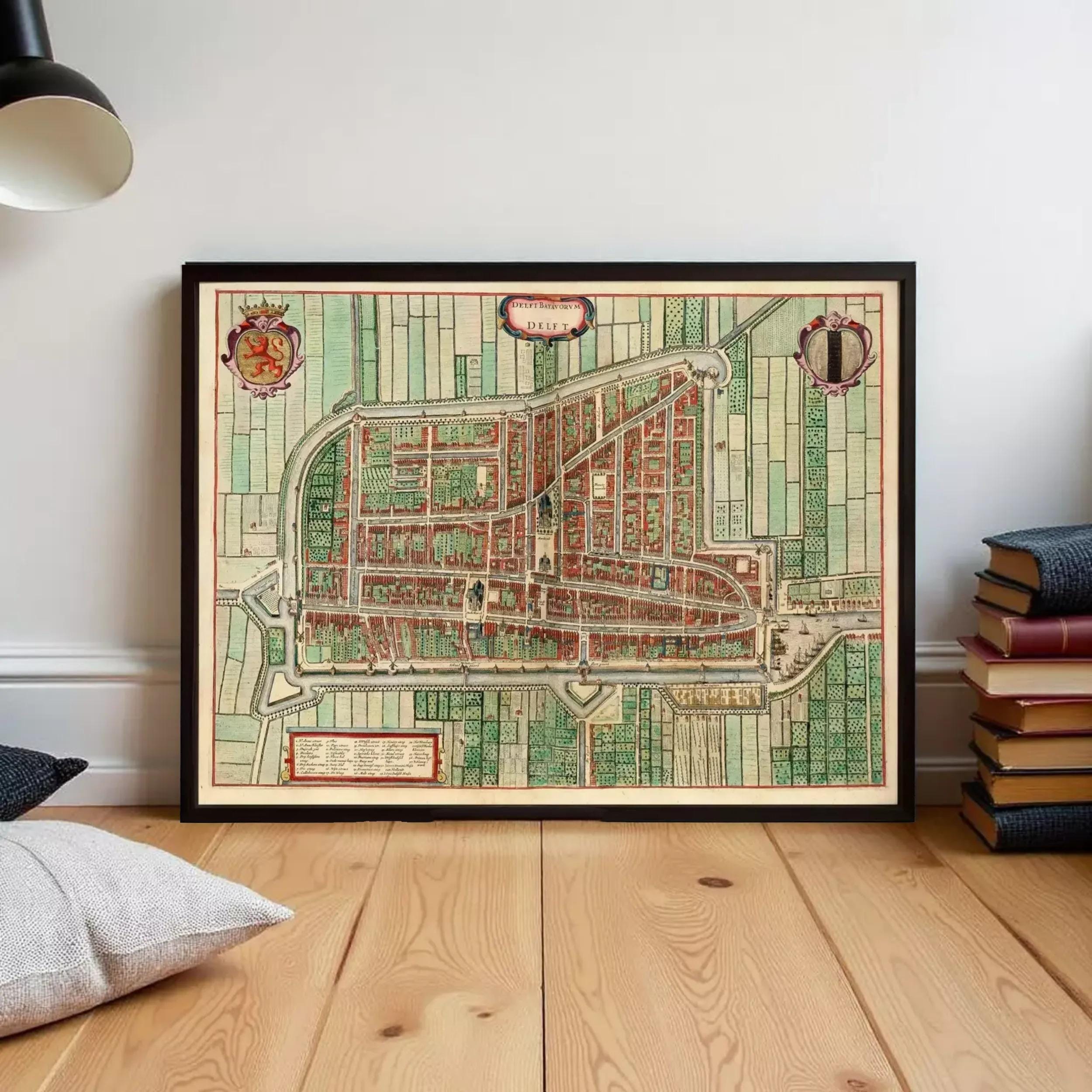 The image is a framed map of a city, depicting a detailed layout of streets, buildings, and other urban features.