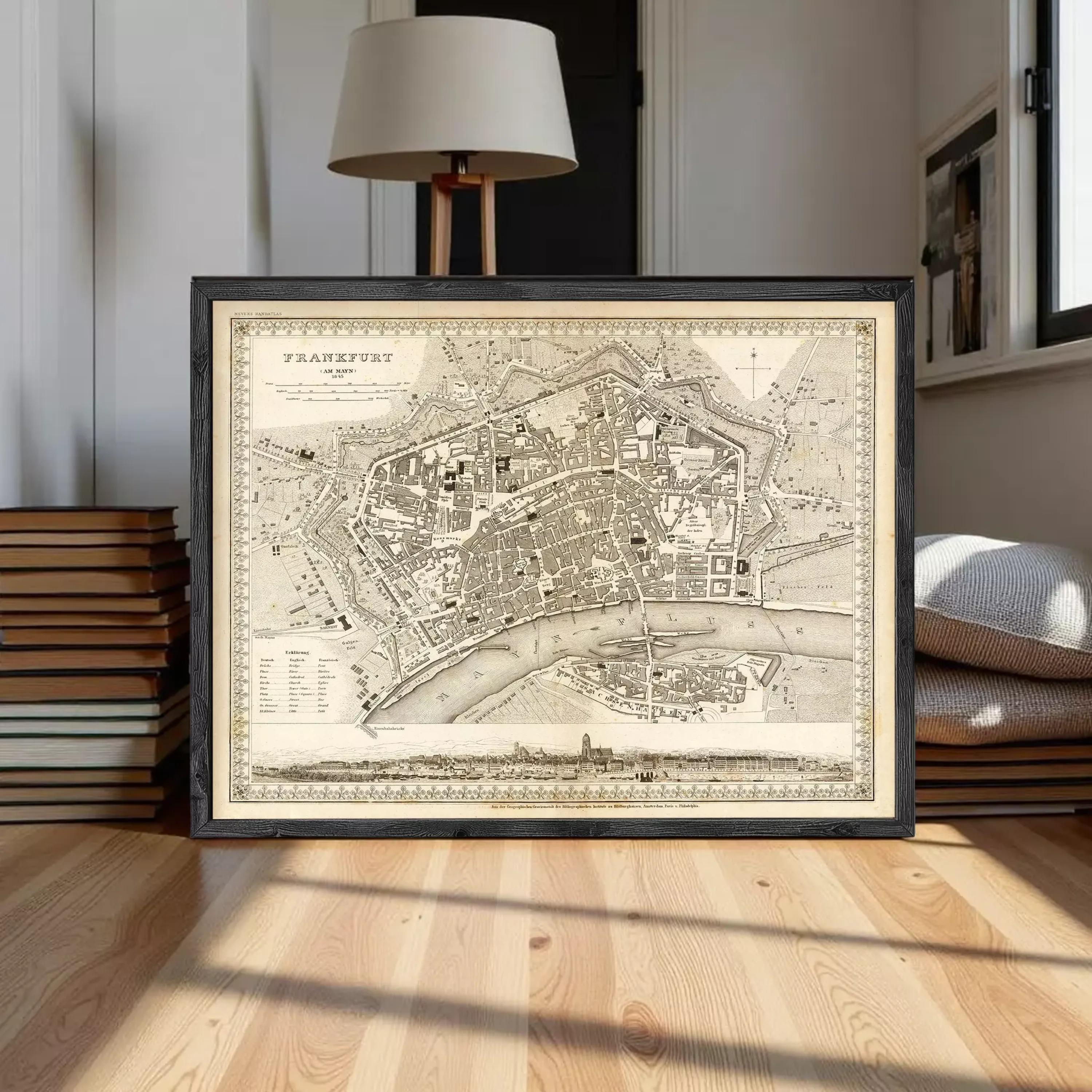 The image is a framed antique map of Frankfurt, Germany, depicting the city's layout and surrounding areas.