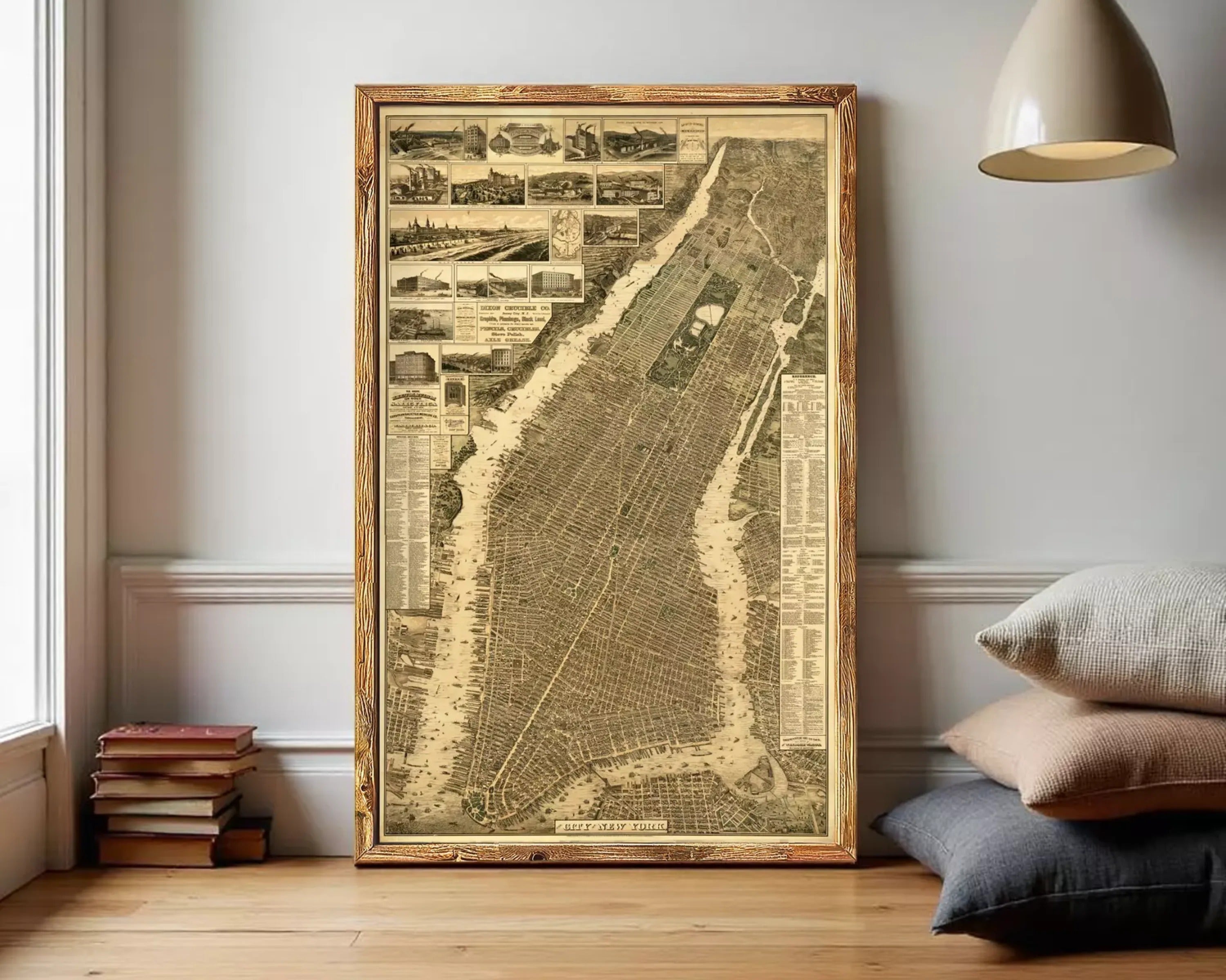 The image is a framed map of New York City, depicting various landmarks and streets in a detailed and intricate manner.