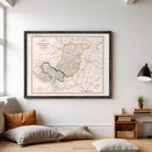The image is a framed vintage map of a region, likely depicting a country or region, with various colored borders and detailed geographical information.