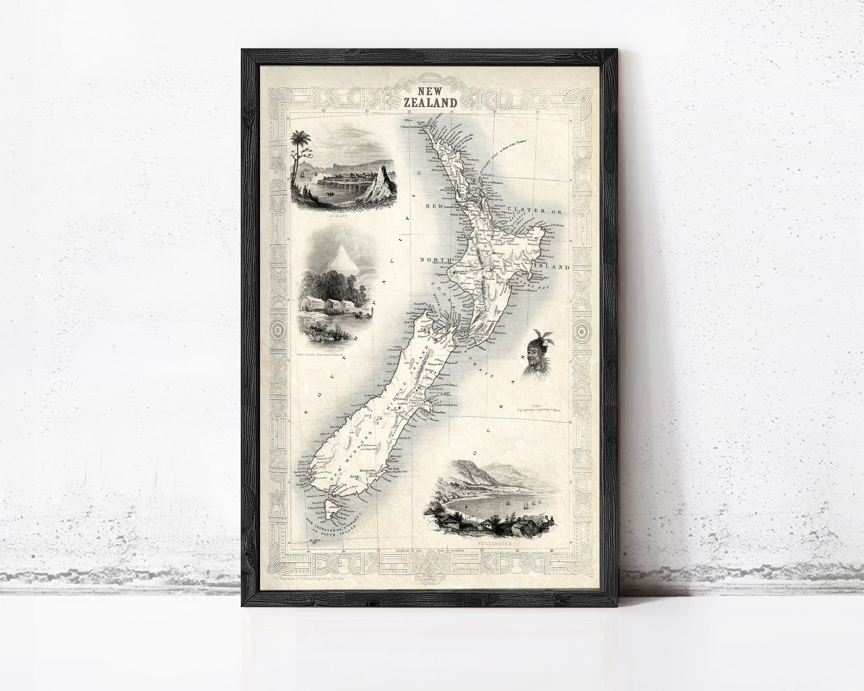 The image is a framed vintage map of New Zealand, featuring various landmarks and geographical features.
