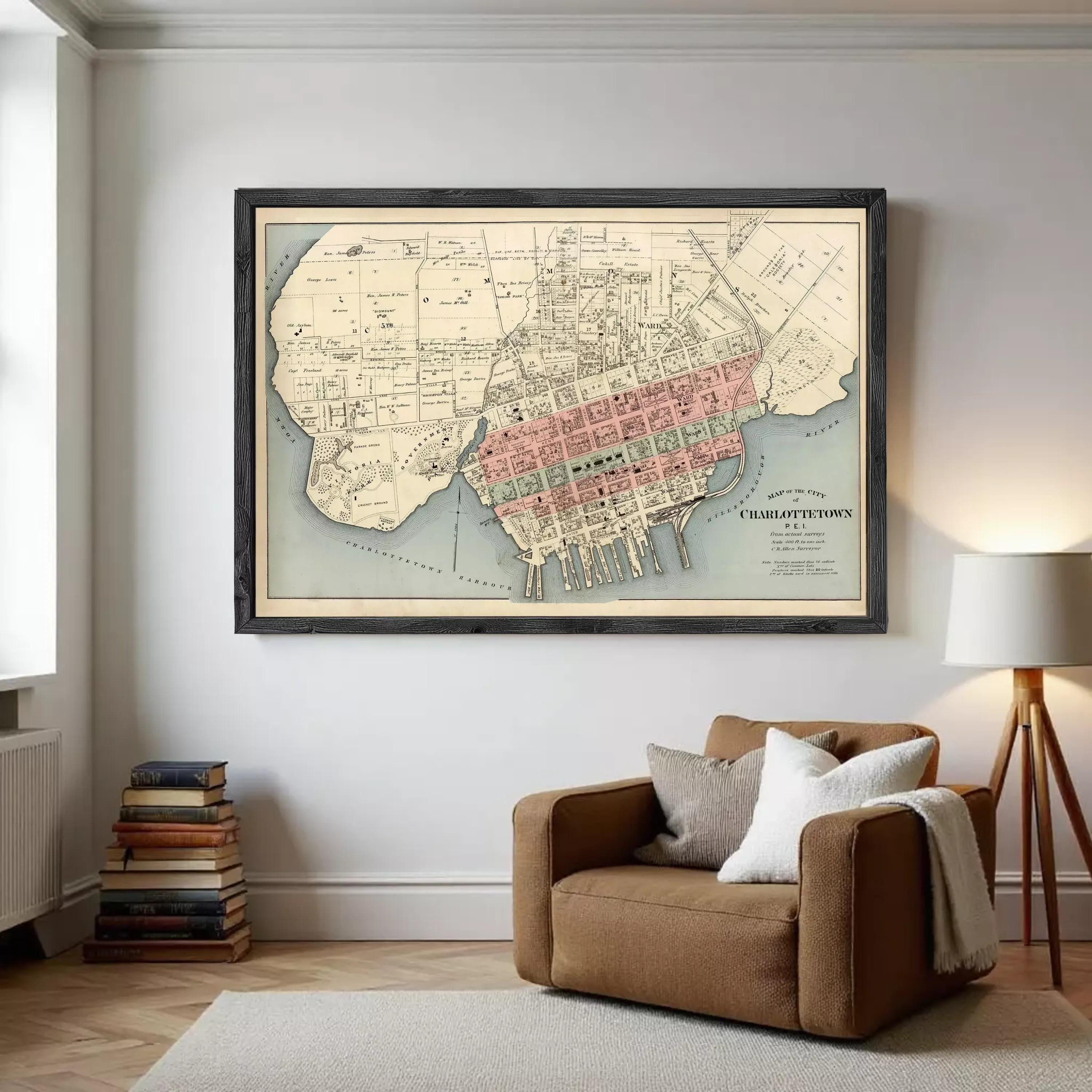 The image is a framed vintage map of the city of Charlottetown, showing the layout of the city and surrounding areas.