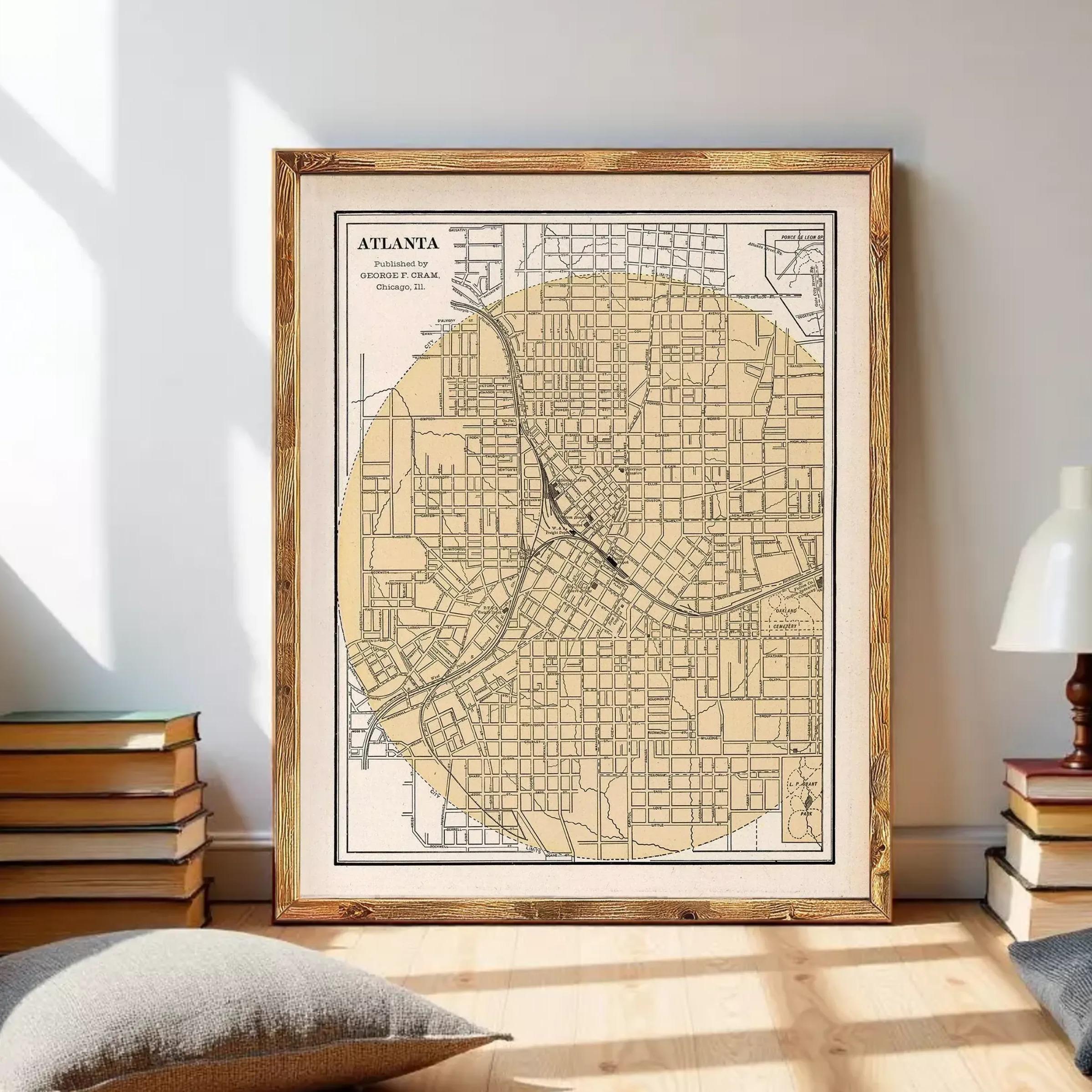 The image is a framed map of Atlanta, Georgia, depicting the city's streets and neighborhoods.