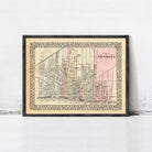 The image is a framed vintage map of Detroit, Michigan, depicting the city's streets and landmarks.