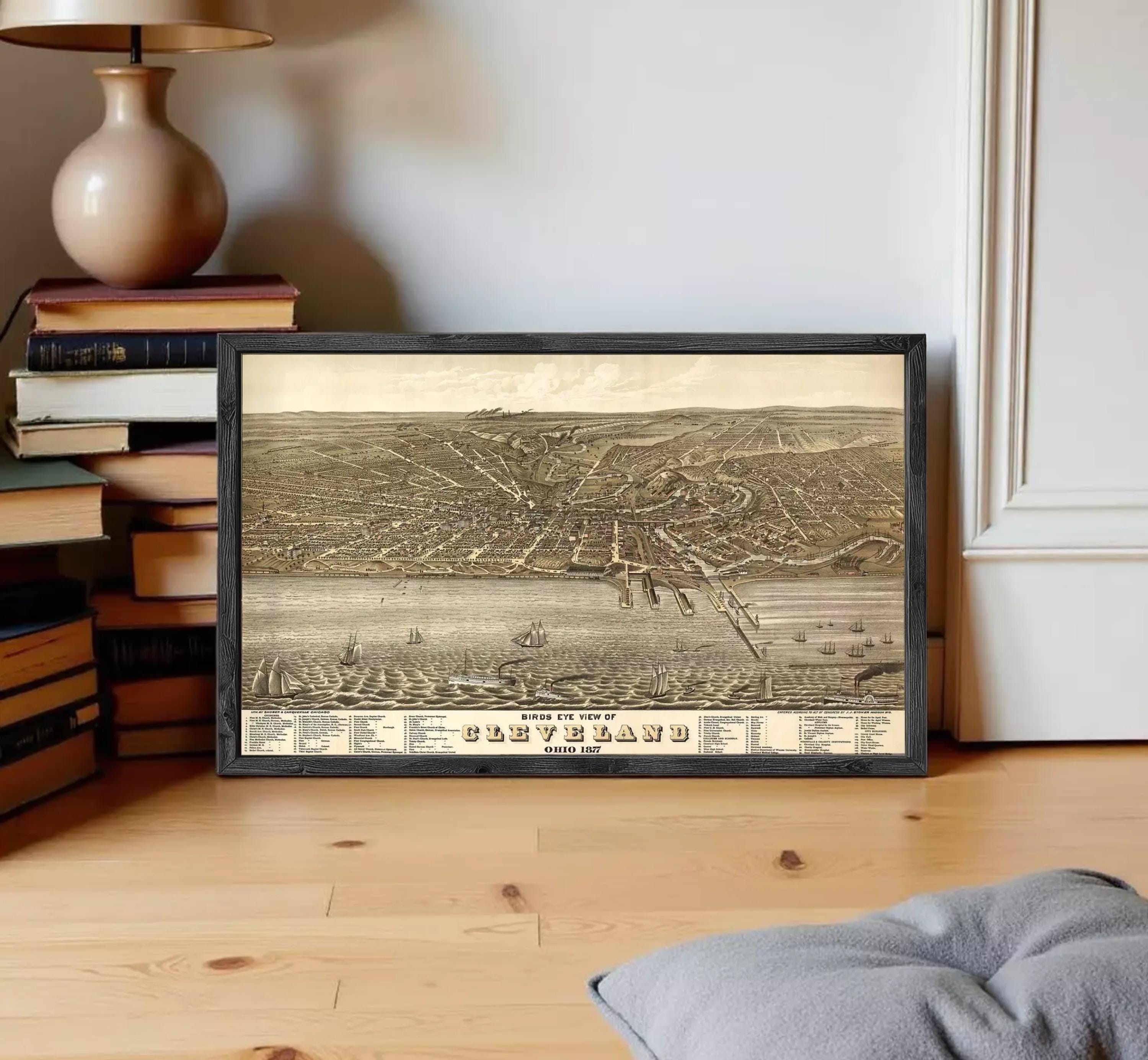 The image is a framed vintage map of Cleveland, Ohio, depicting the city's layout and surrounding areas.