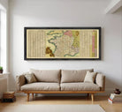 A framed map of Europe and the surrounding areas, with a detailed and colorful depiction of the continent and its countries.