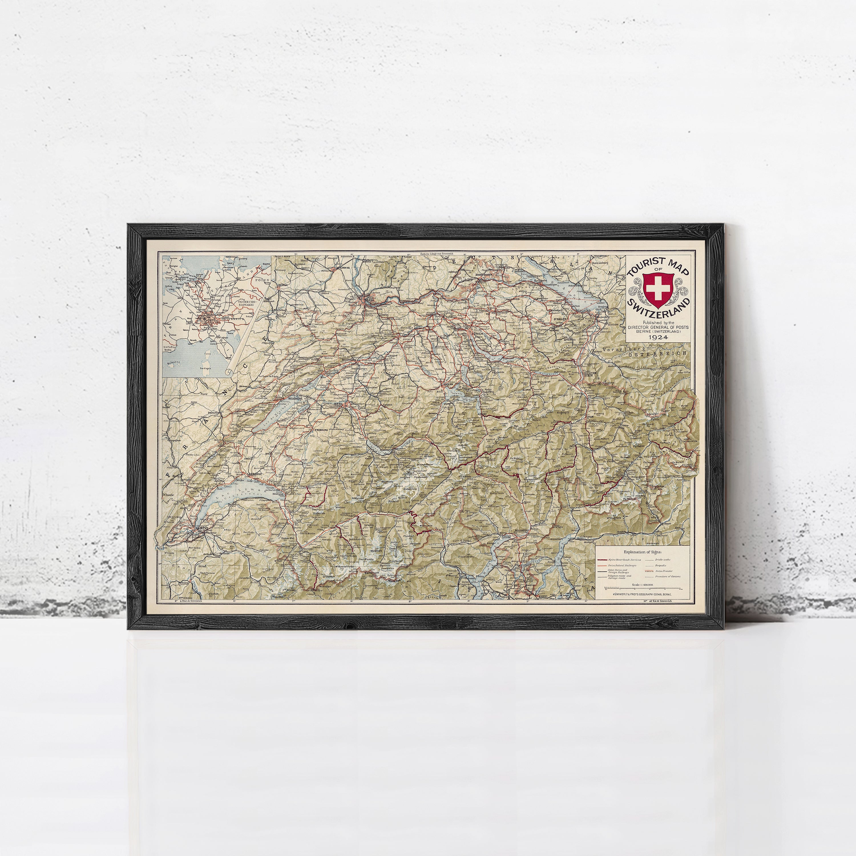 The image is a framed map of Switzerland, depicting various geographical features and locations.
