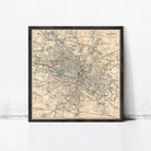 The image is a framed vintage map of Glasgow, Scotland, depicting the city's streets and landmarks in a detailed and intricate manner.