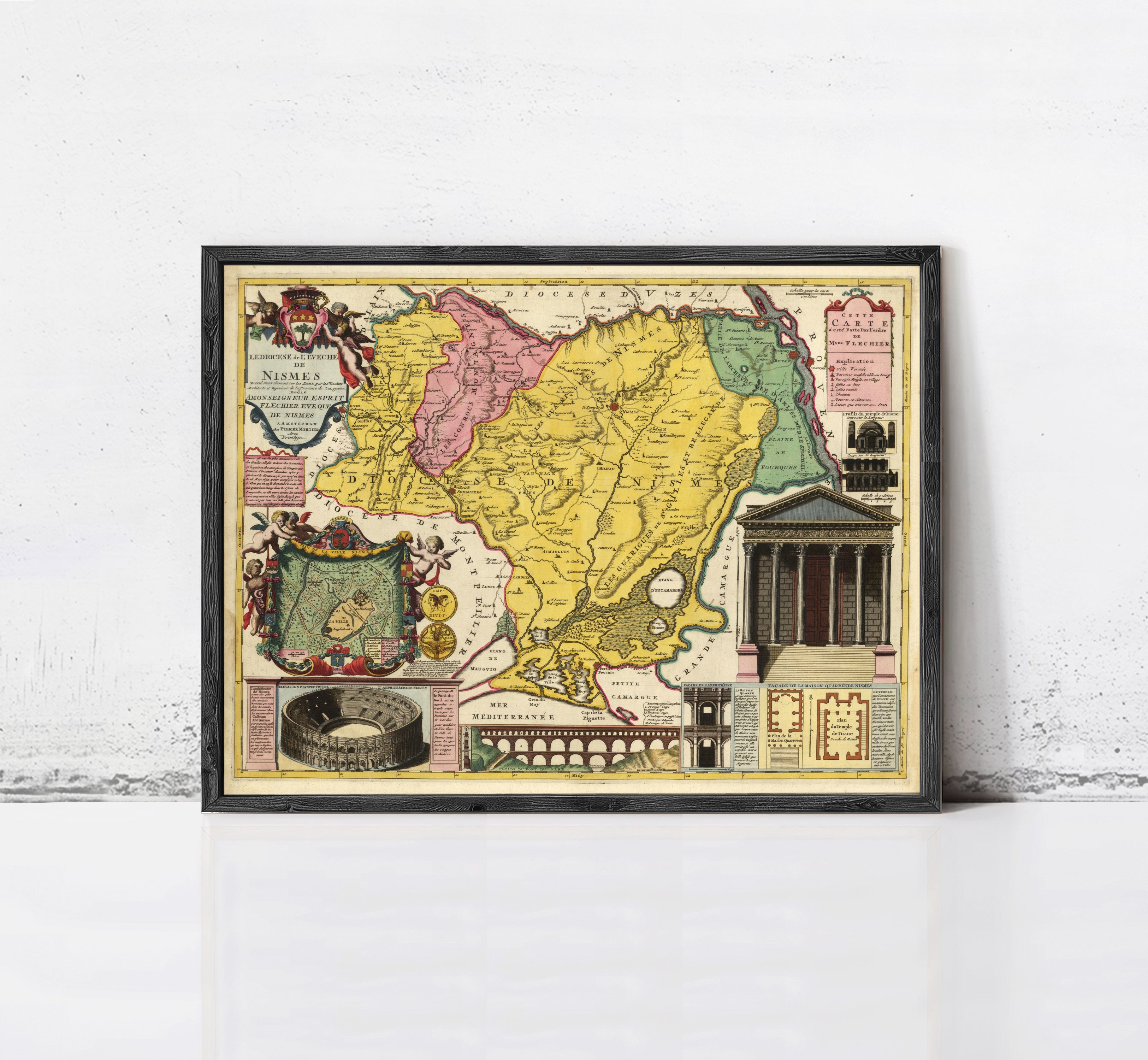 The image is a framed vintage map of the Nubia region, which includes illustrations of the Roman Colosseum, a temple, and other landmarks.