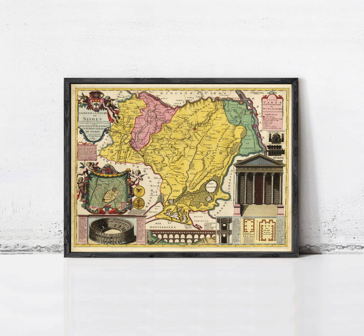 The image is a framed vintage map of the Nubia region, which includes illustrations of the Roman Colosseum, a temple, and other landmarks.