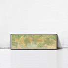 A framed map of a city or region, with various streets and landmarks depicted in a vintage style.