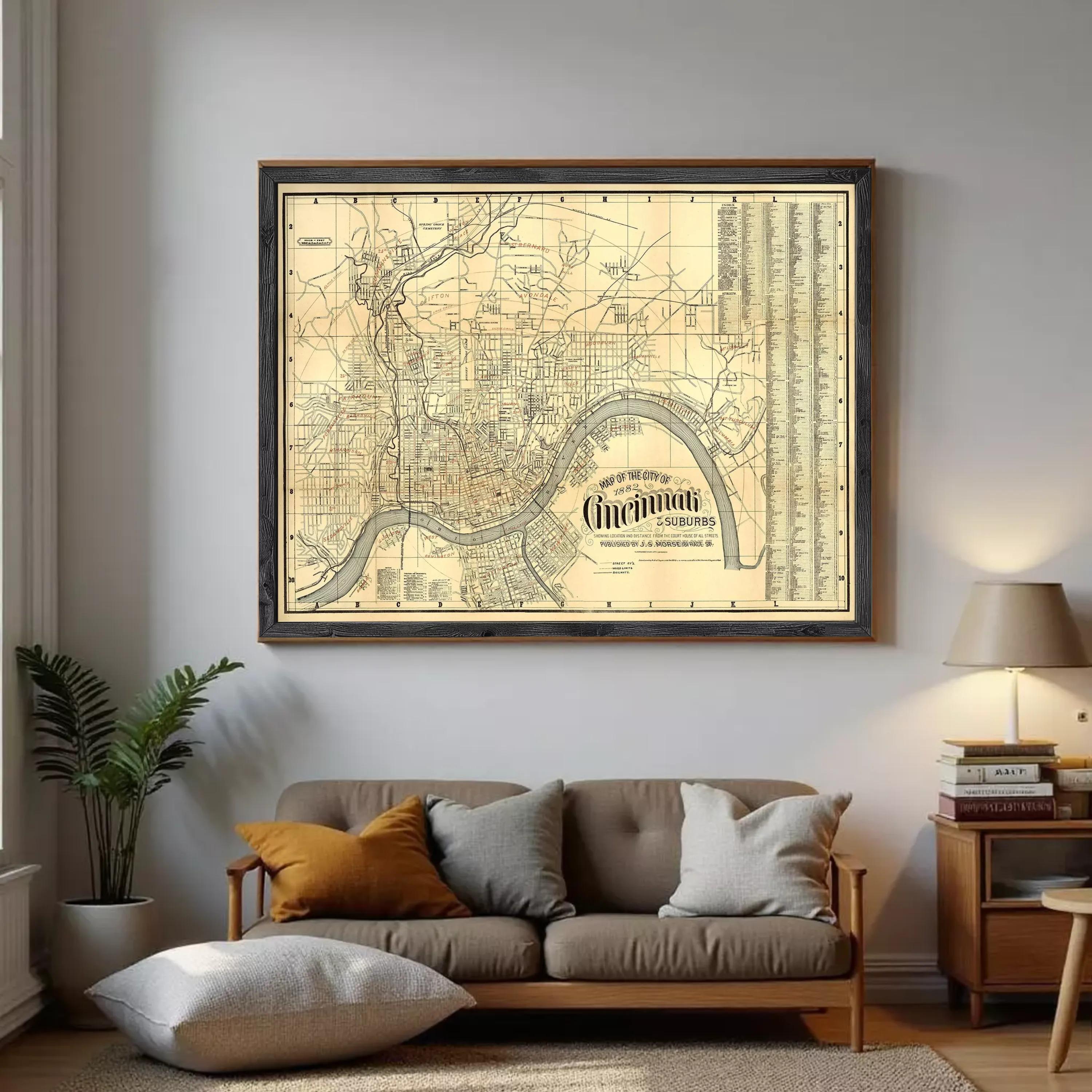 The image is a framed vintage map of Cincinnati, Ohio, showing the city's streets and surrounding areas.