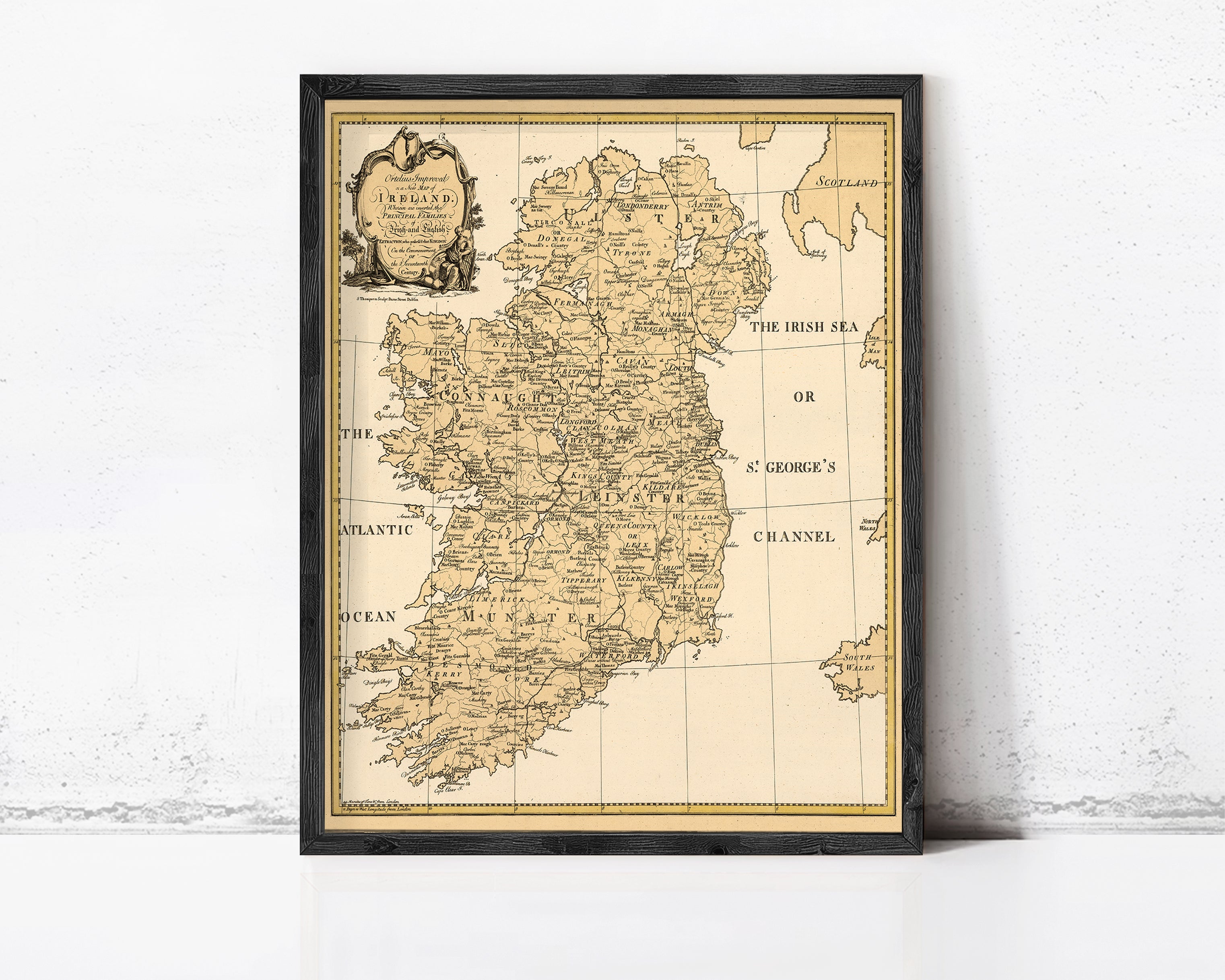 The image is a framed map of Ireland, showing the country's geographical layout and major cities.
