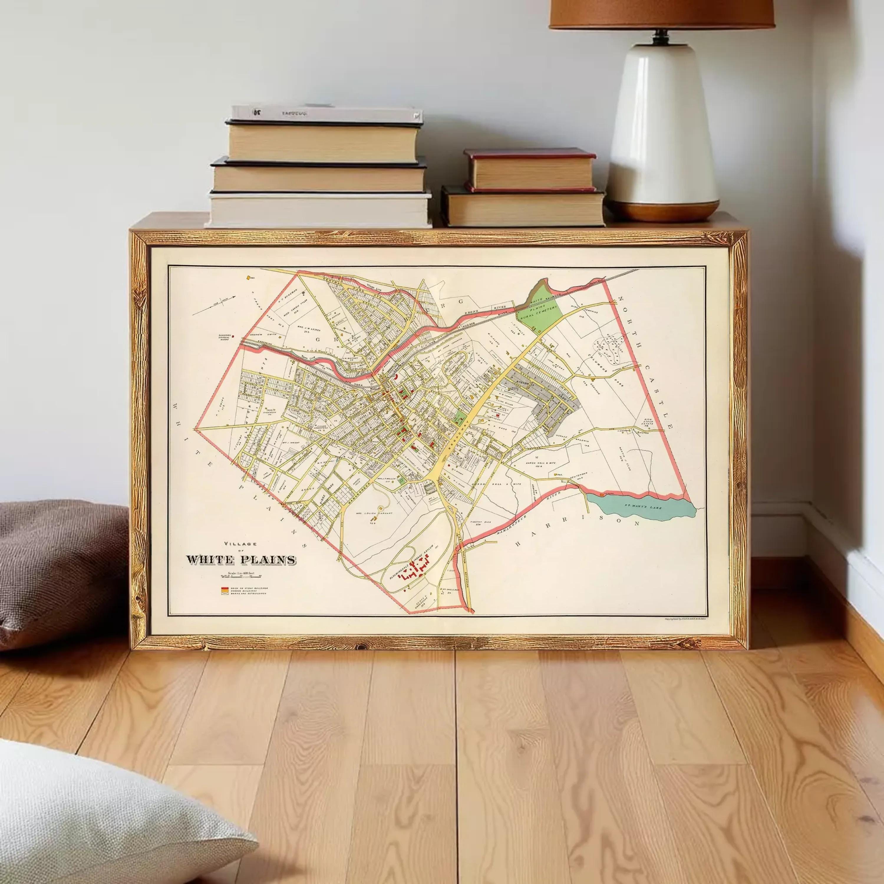 The image is a framed map of the White Plains, New York, with a wooden border.