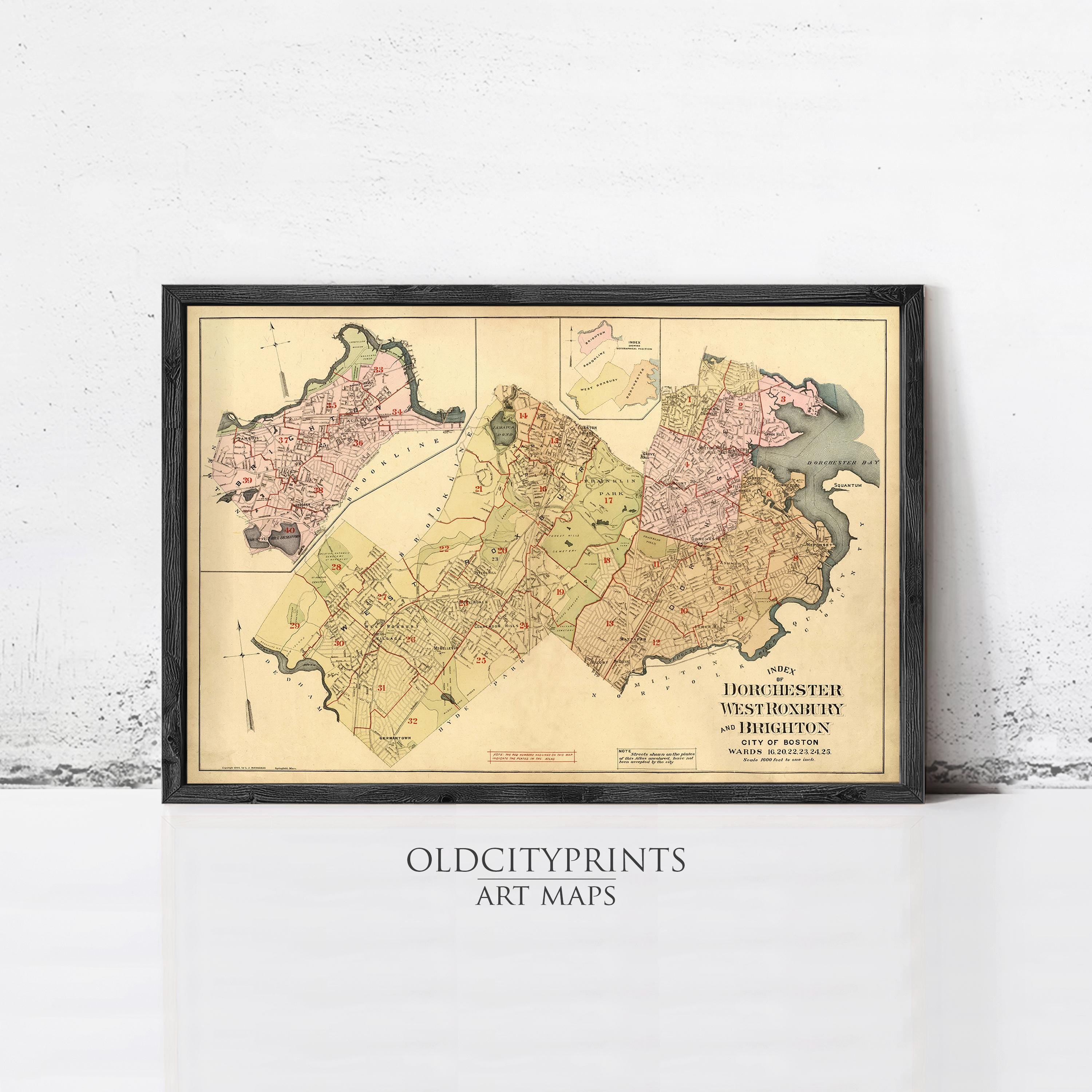 The image is a framed vintage map of the New York City area, depicting the city's streets and neighborhoods.