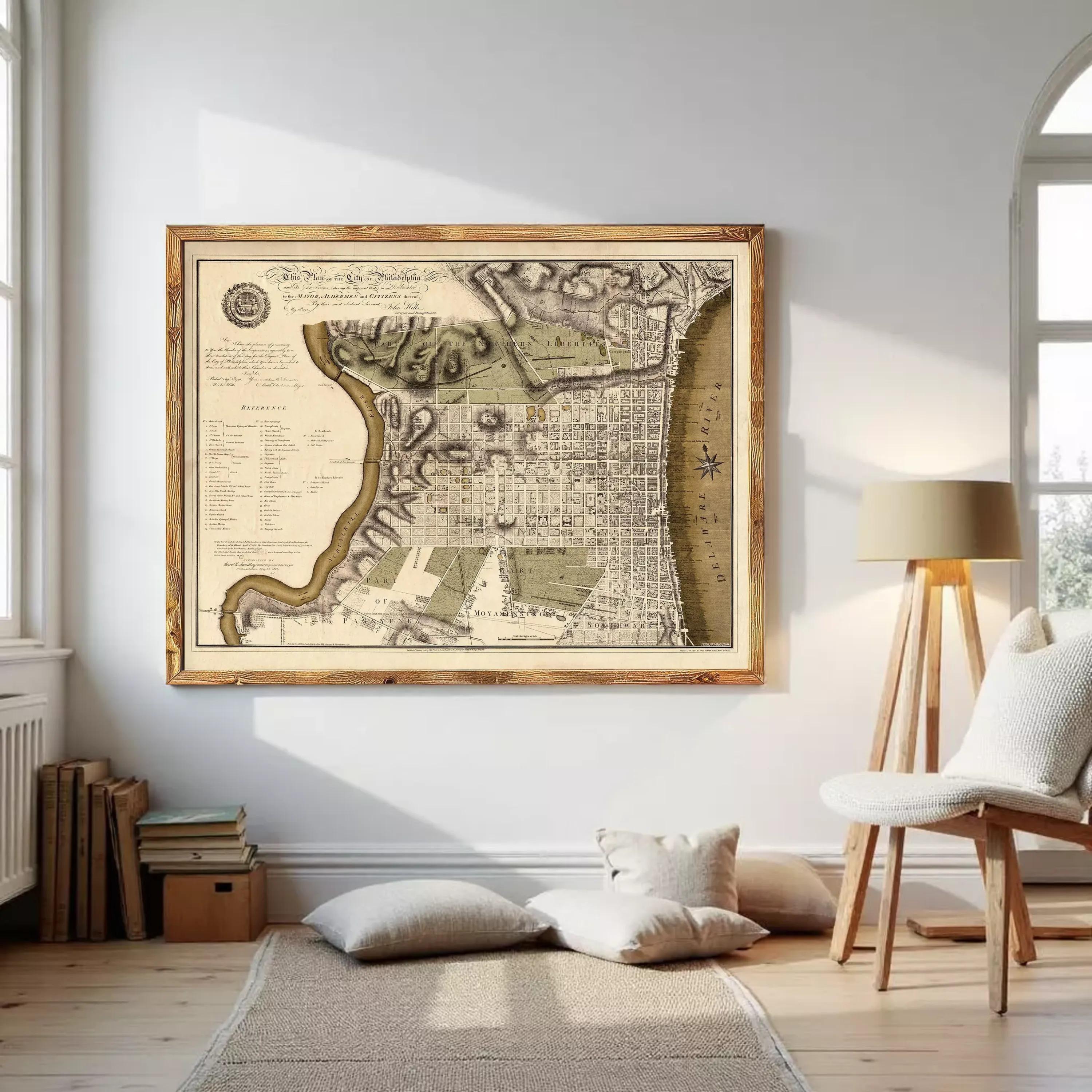 The image is a framed antique map of Philadelphia, Pennsylvania, depicting the city's layout and surrounding areas.