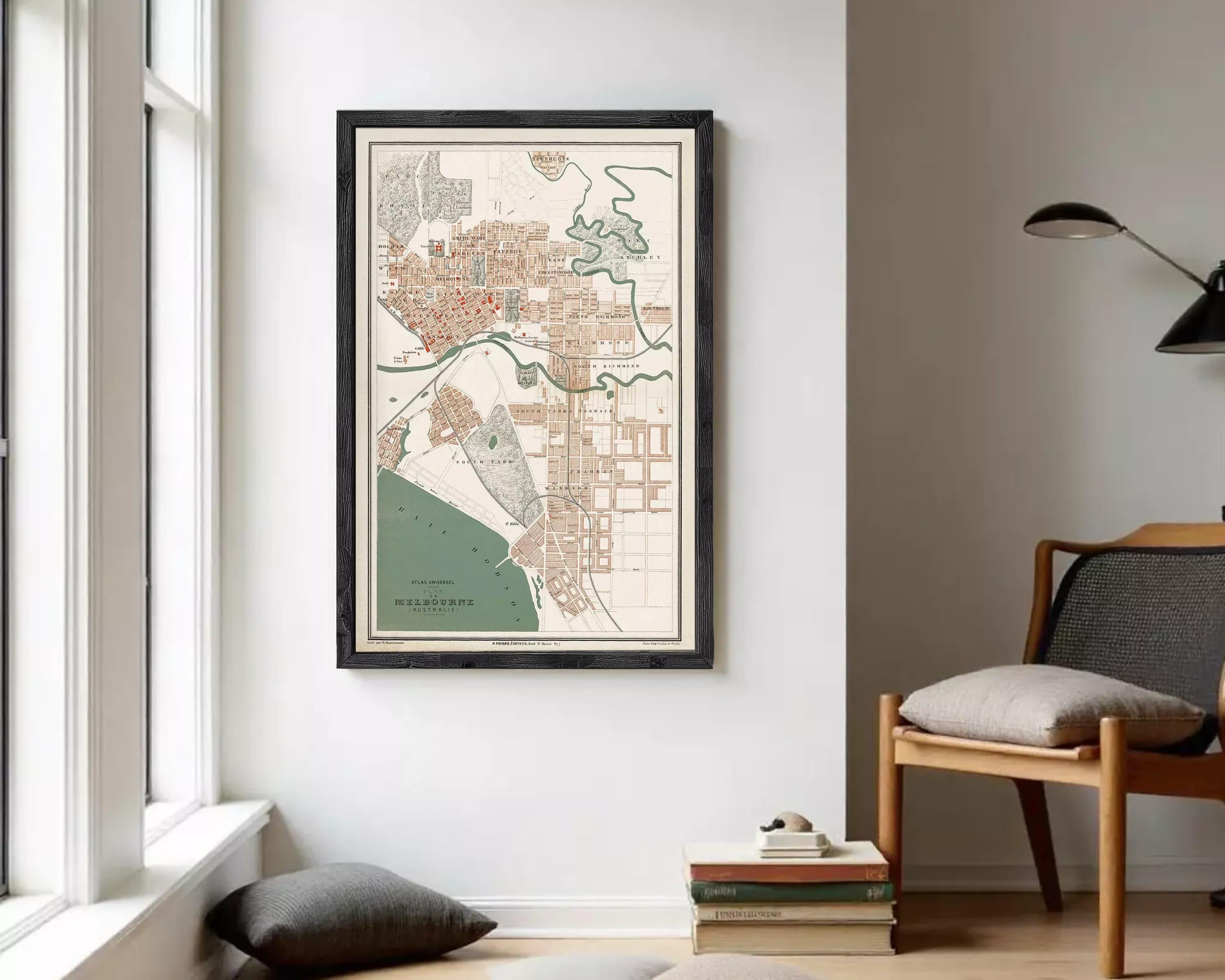 The image is a framed vintage map of Melbourne, Australia, depicting the city's layout and surrounding areas.