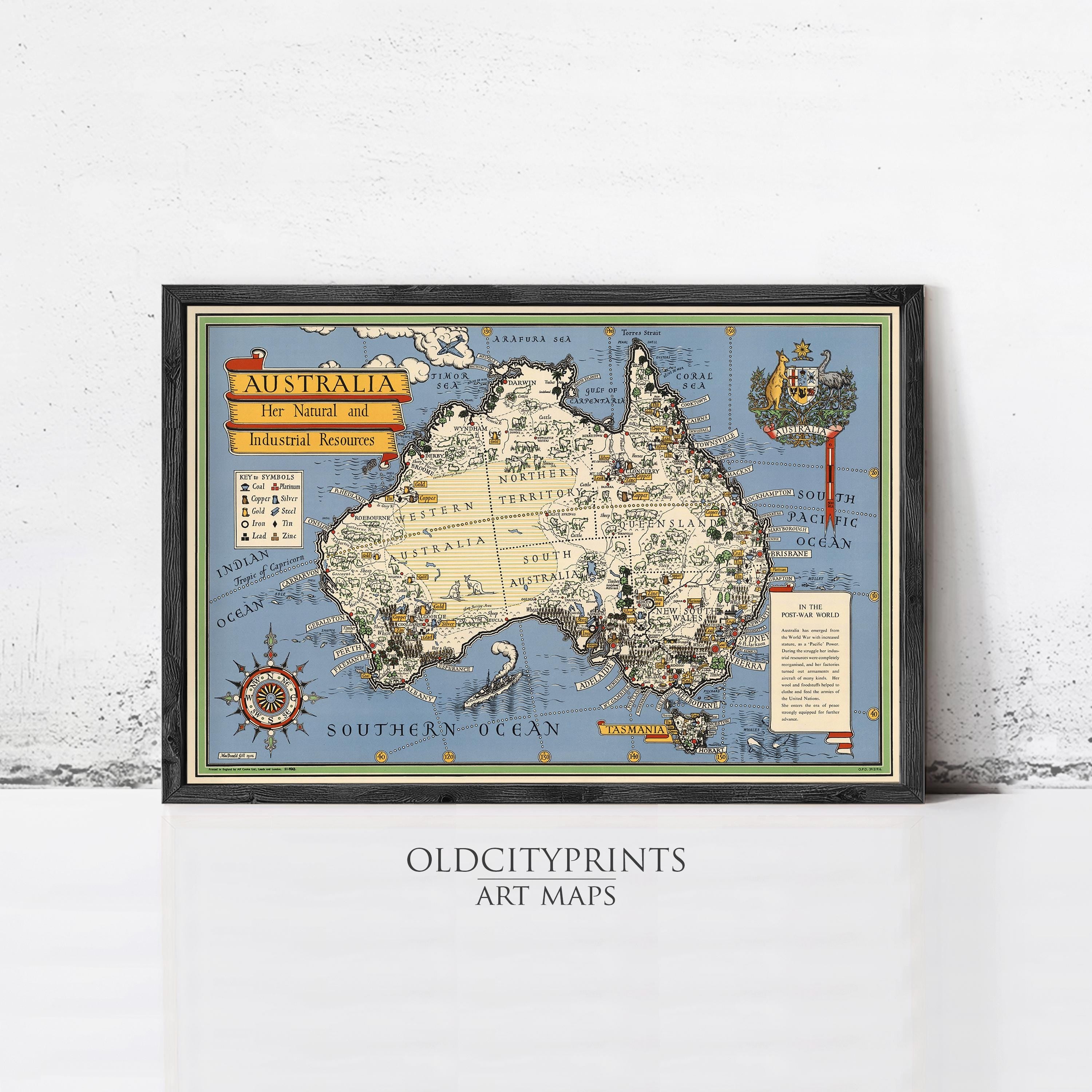 The image is a framed vintage map of Australia, depicting the country's geographical features and landmarks.
