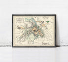 The image is a framed vintage map of a city, depicting various landmarks and streets.