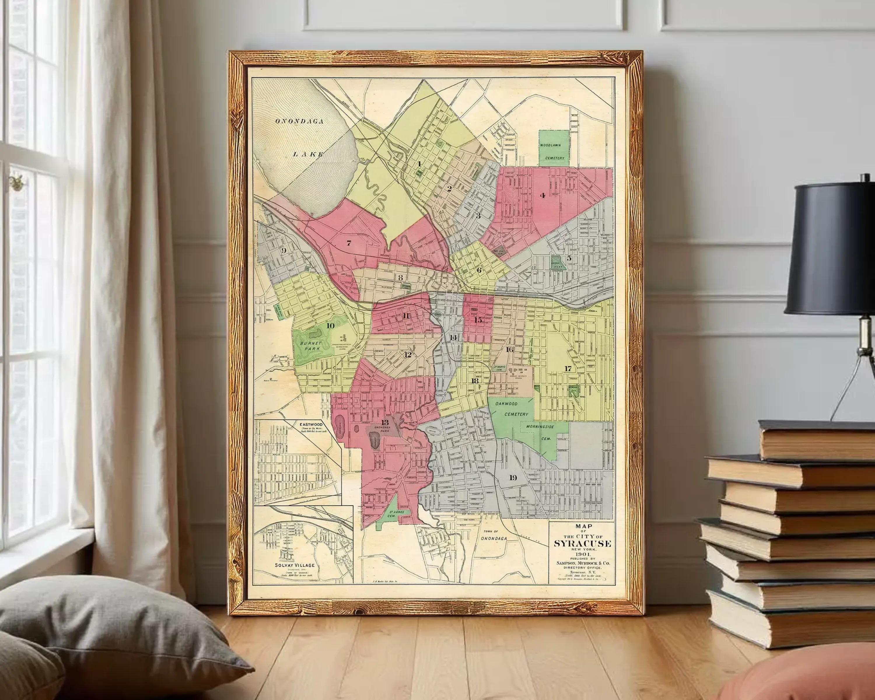 The image is a framed map of a city, showing various neighborhoods and streets.