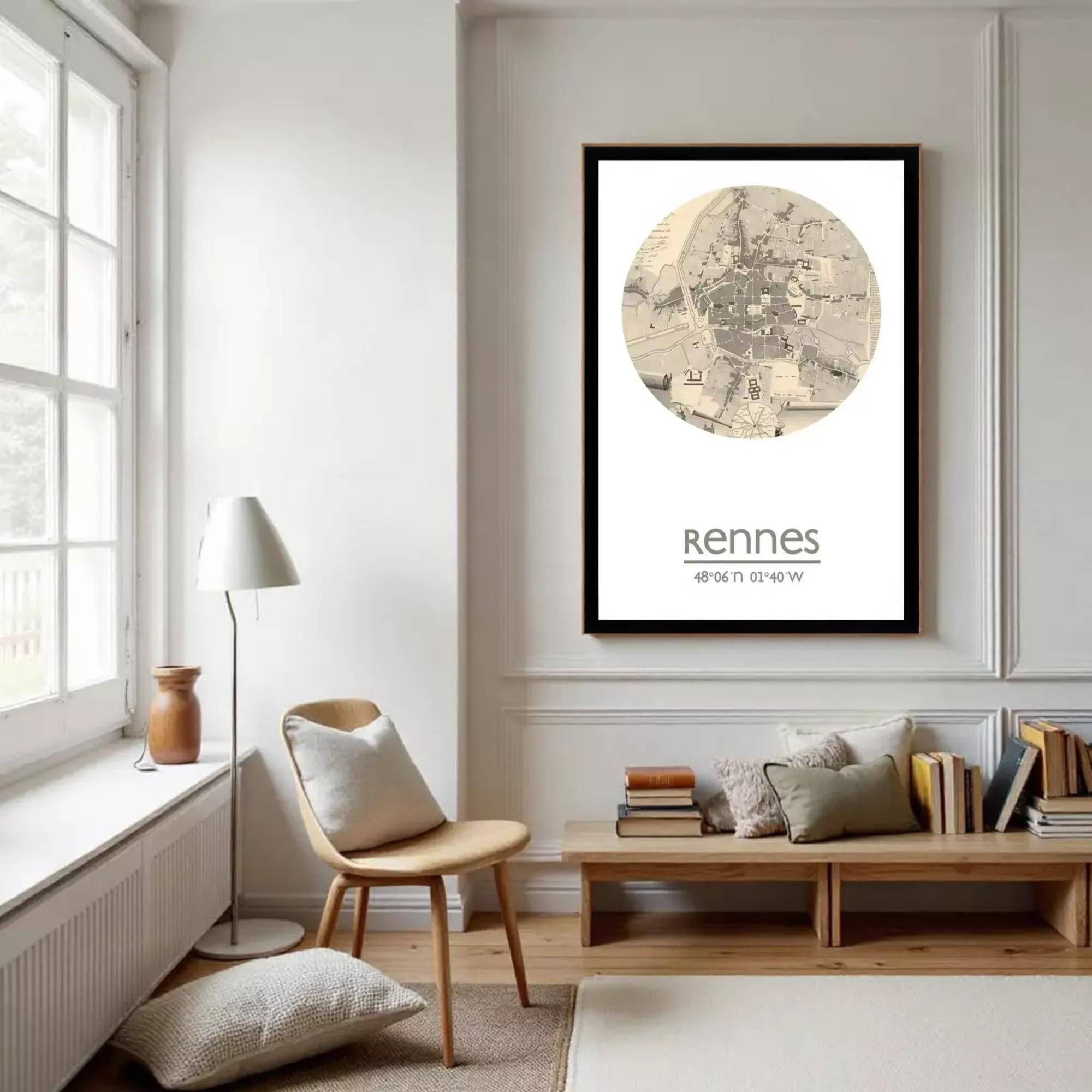 The image is a framed print of a map of Rennes, France, with the name "Rennes" and the location "48.06.07 1.40°W" printed below the map.
