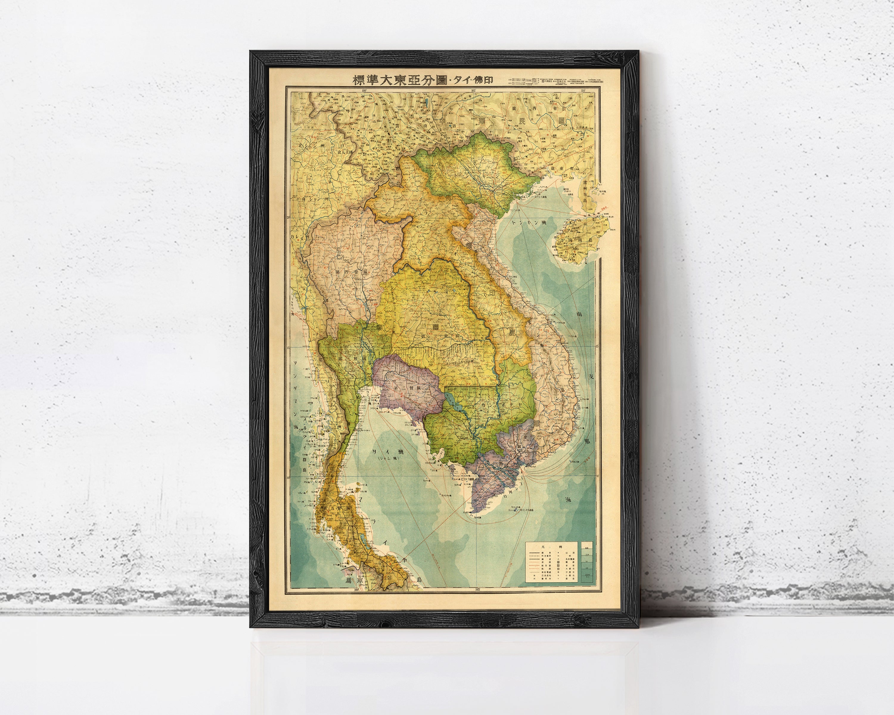 The image is a framed vintage map of Southeast Asia, including countries such as Thailand, Vietnam, and Laos.