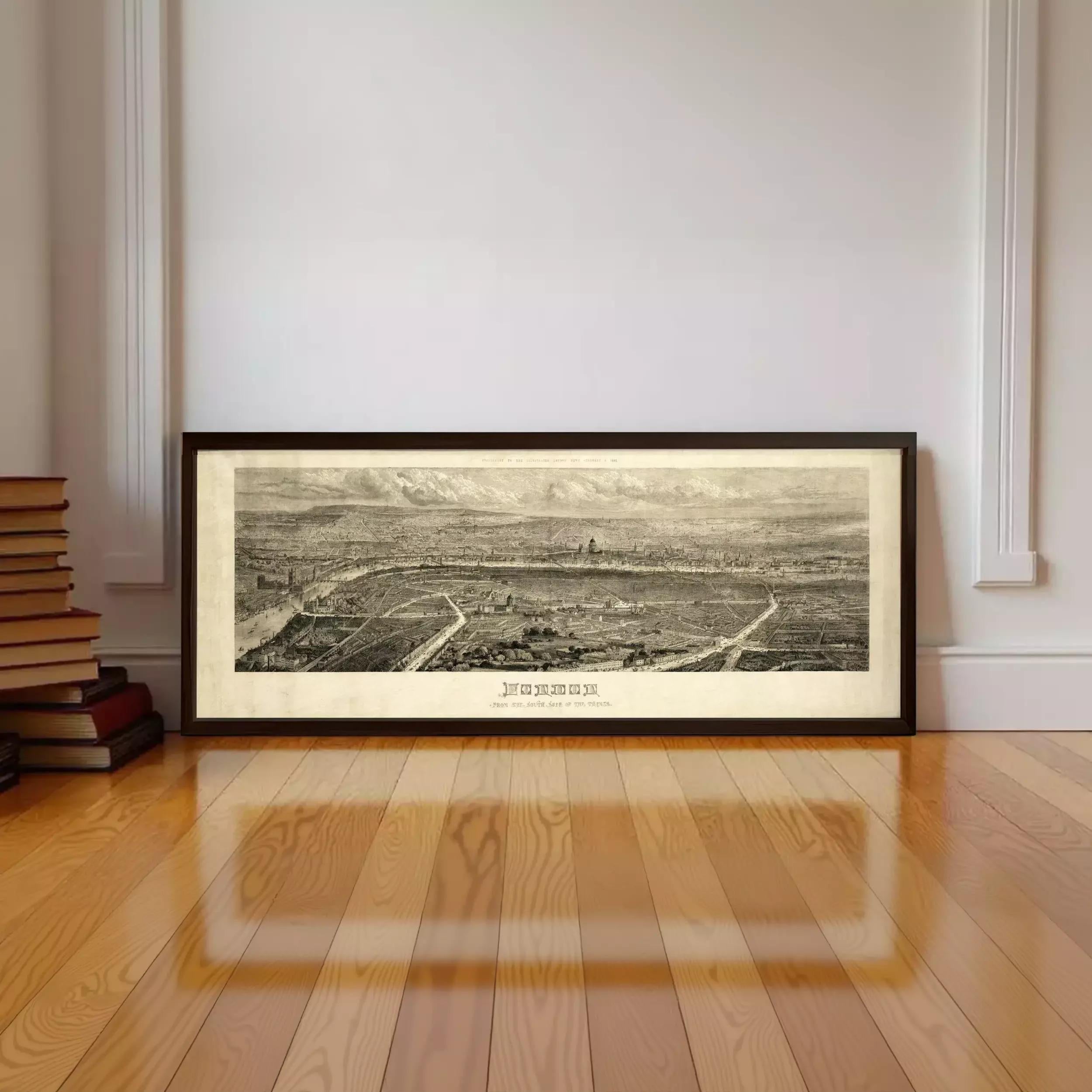 A large framed black and white map of a city or region, depicting a detailed aerial view of the area.