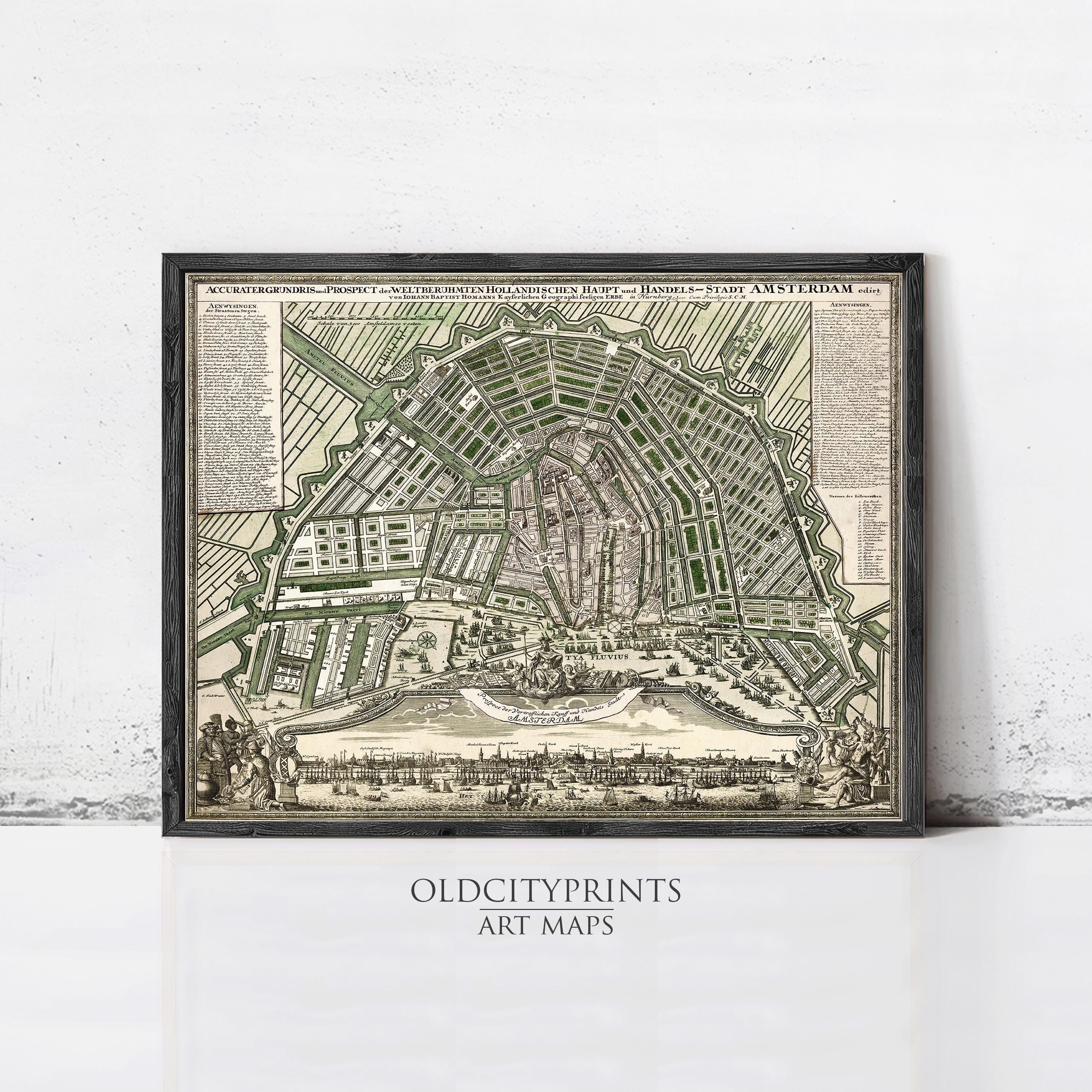 The image is a framed antique map of Amsterdam, Netherlands, depicting the city's layout and streets.