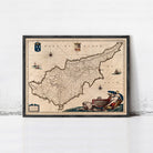 The image is a framed map of the island of Cyprus, depicting various landmarks and geographical features.