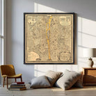 The image is a framed vintage map of a city, depicting a detailed layout of streets, buildings, and other urban features.